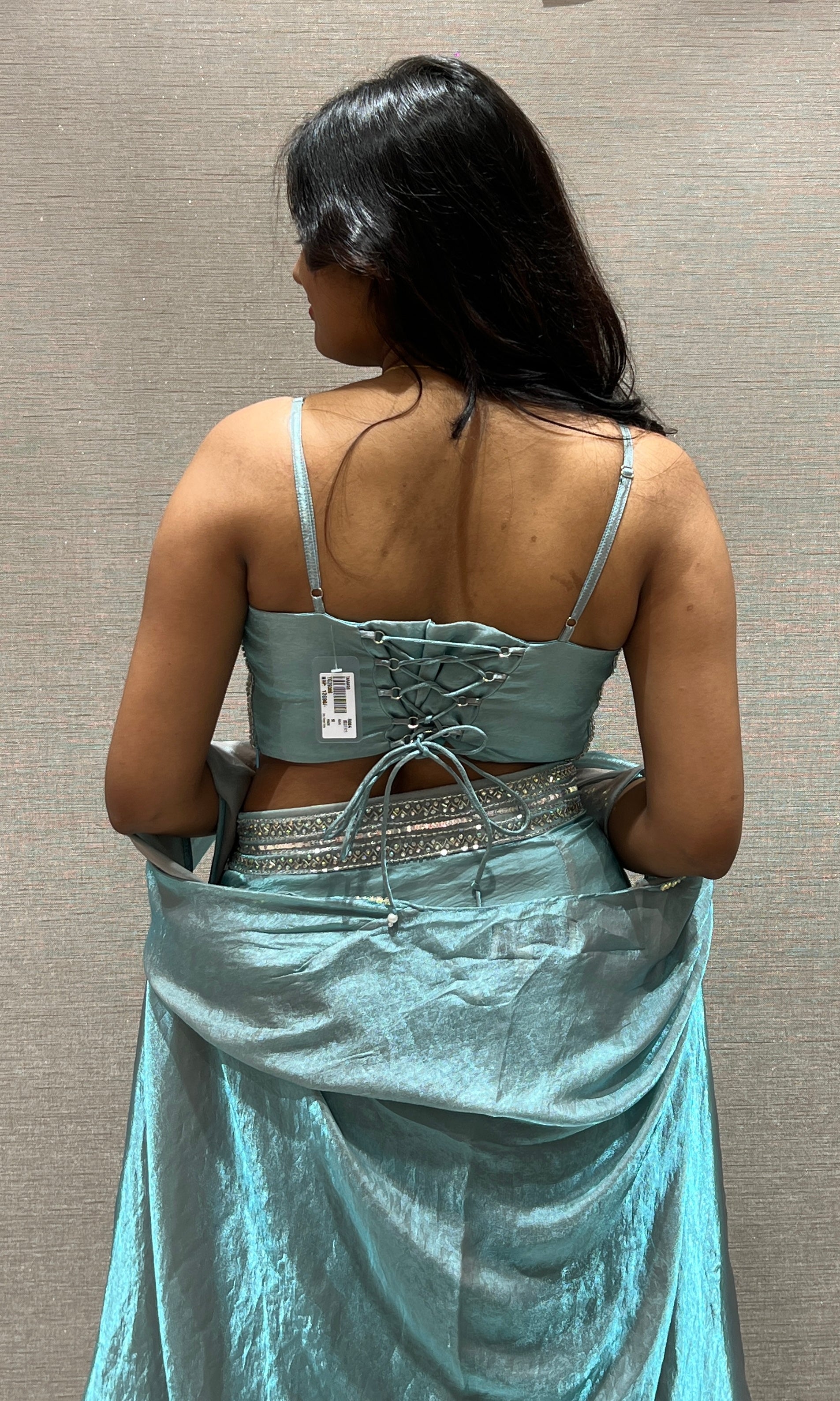 Aqua blue draped saree with Crystal Blouse