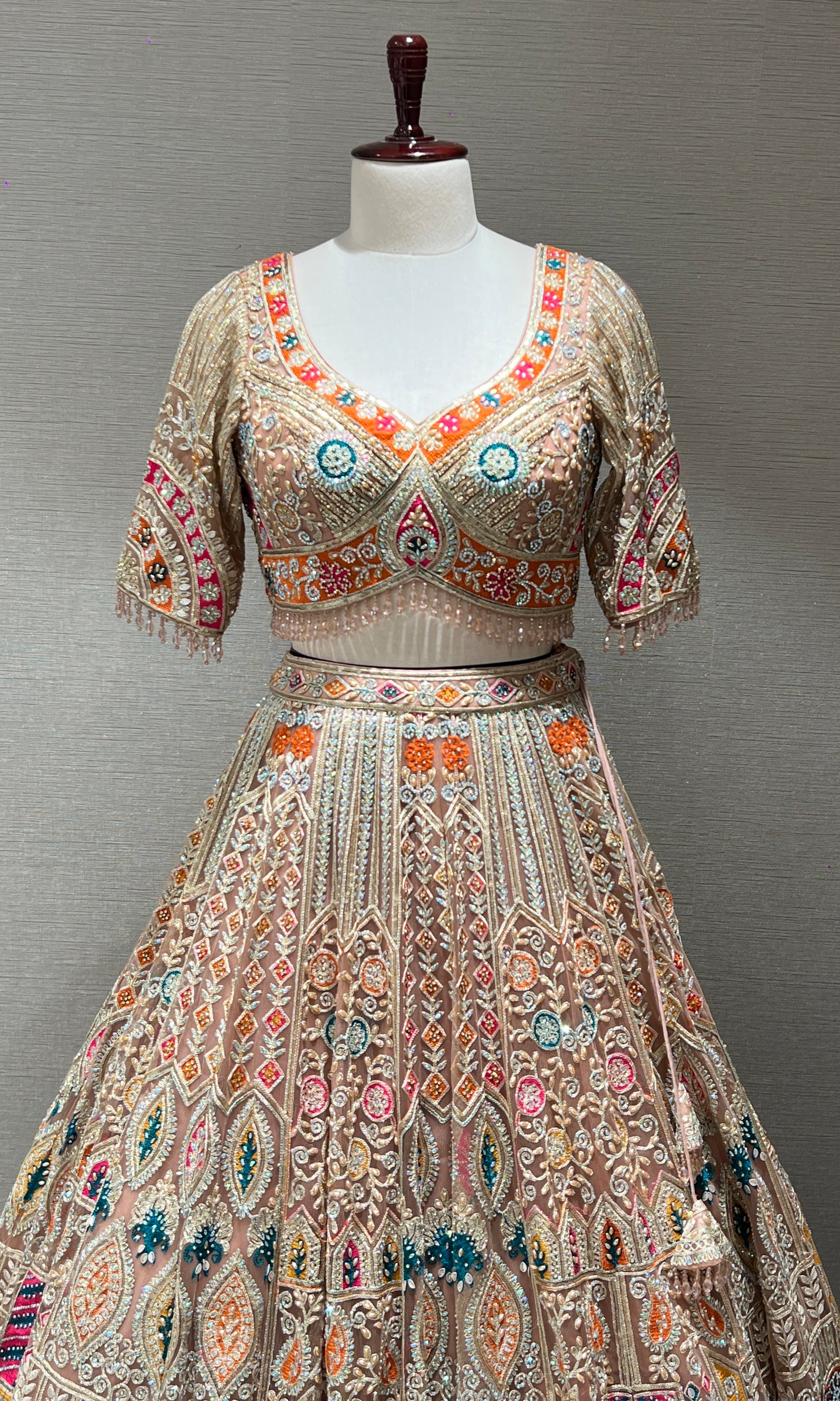 Peach Lehenga with Sequin and stone embellishments