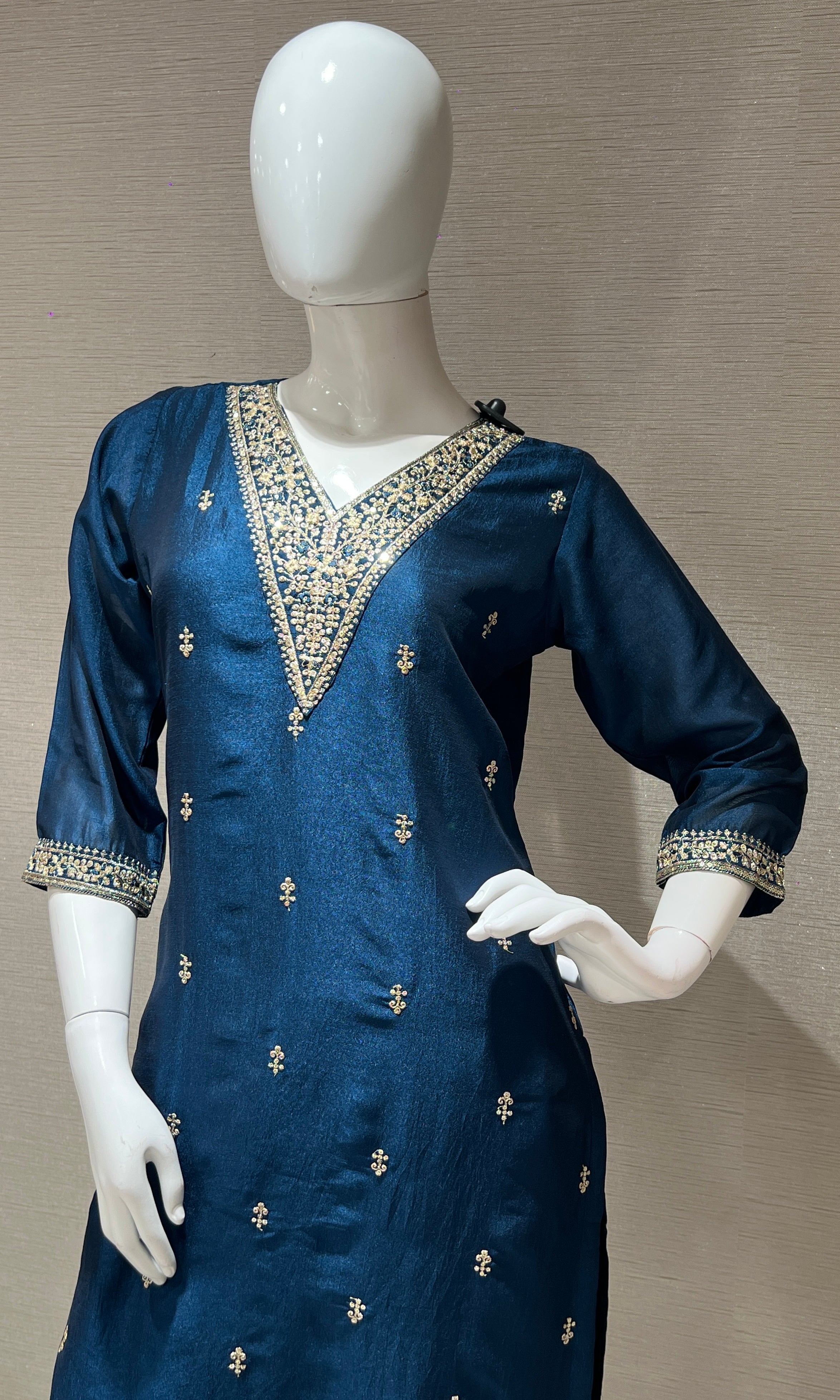 peacock blue kurta set with gold duppatta