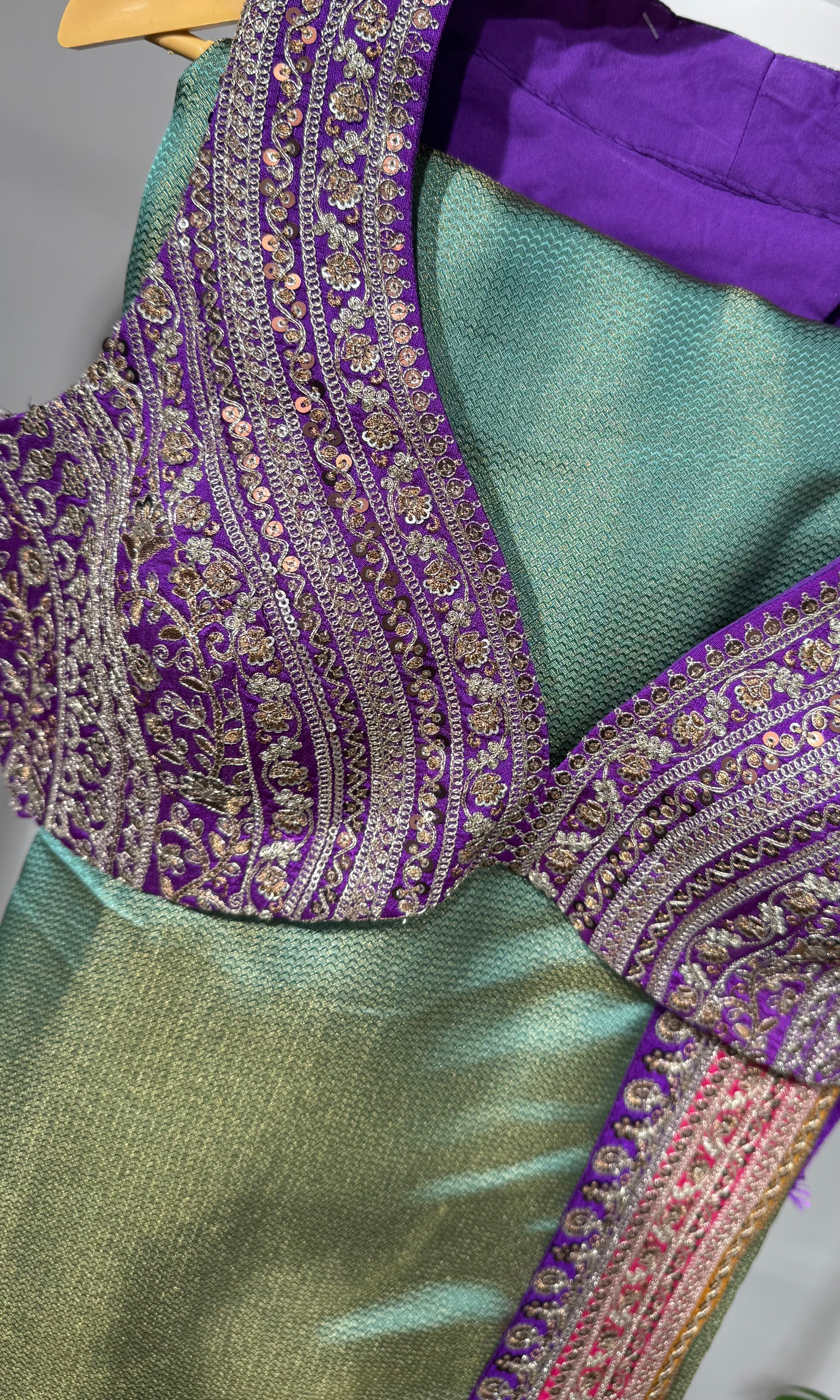 Green saree with embroidered blouse