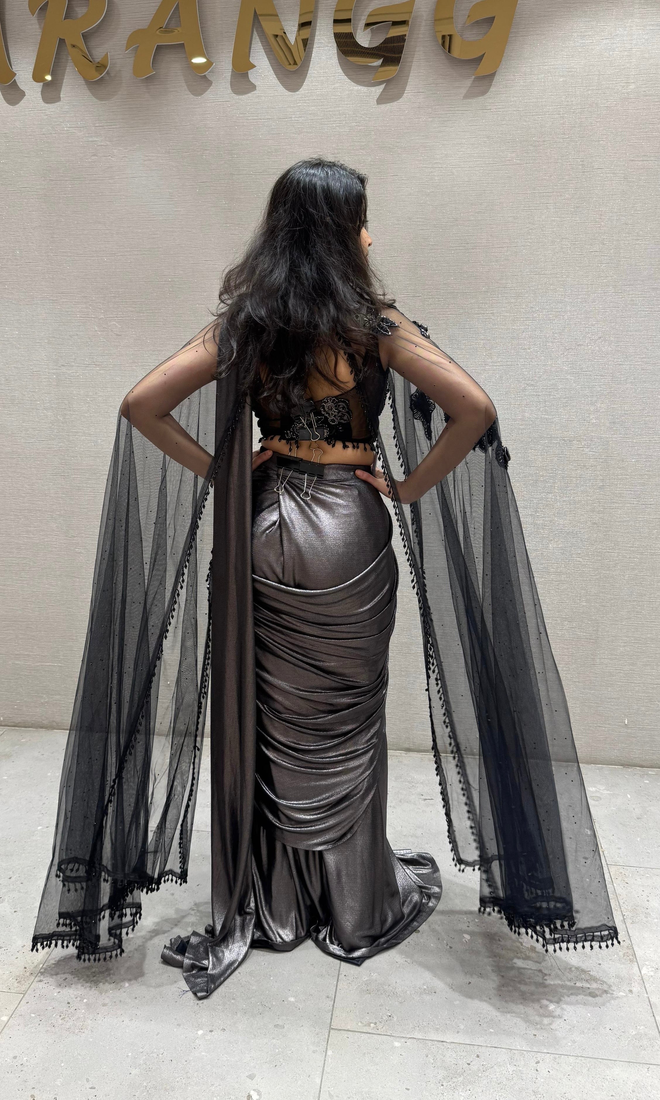 Black sequin drape saree with sheer cape