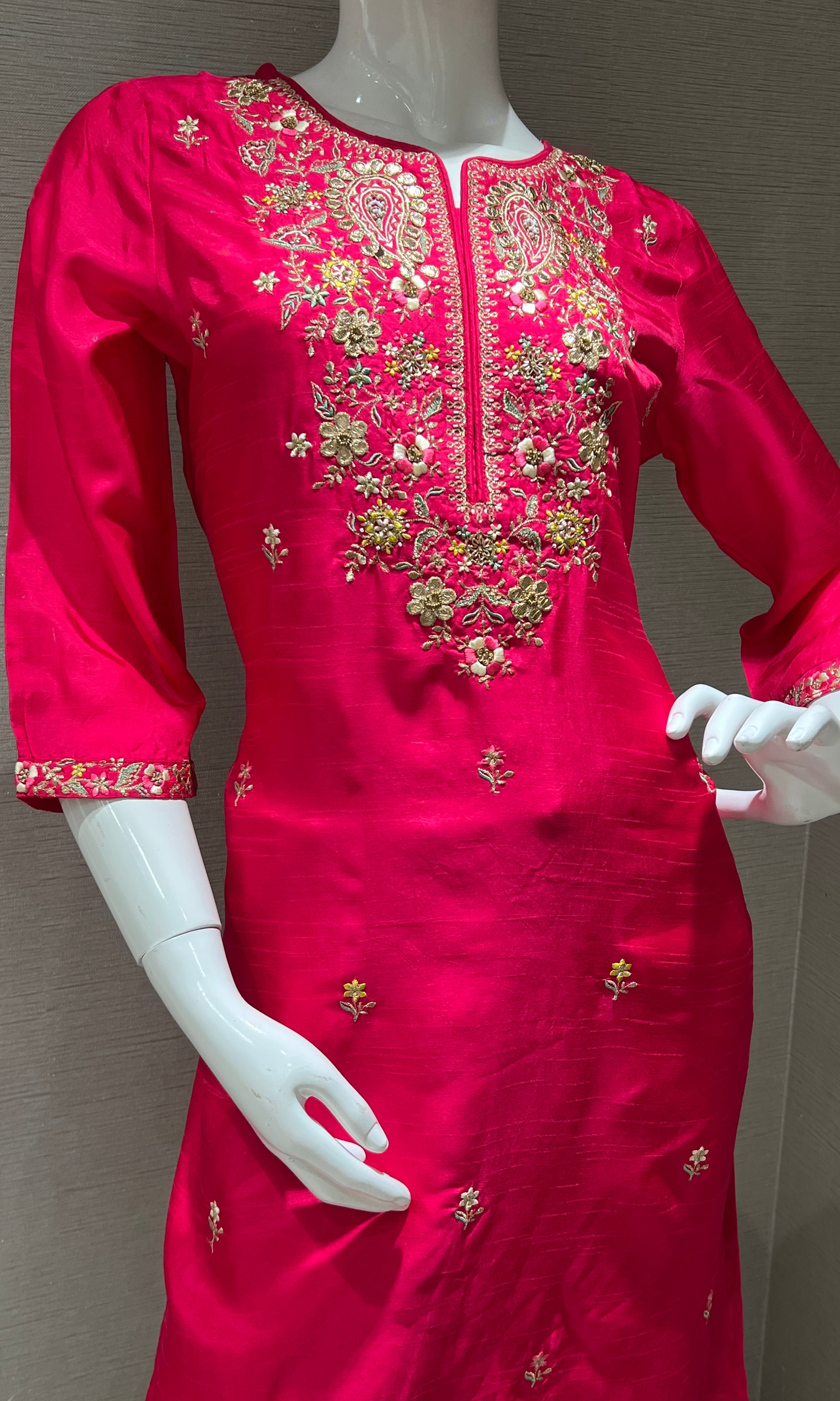 Pink kurta set with a yellow dupatta