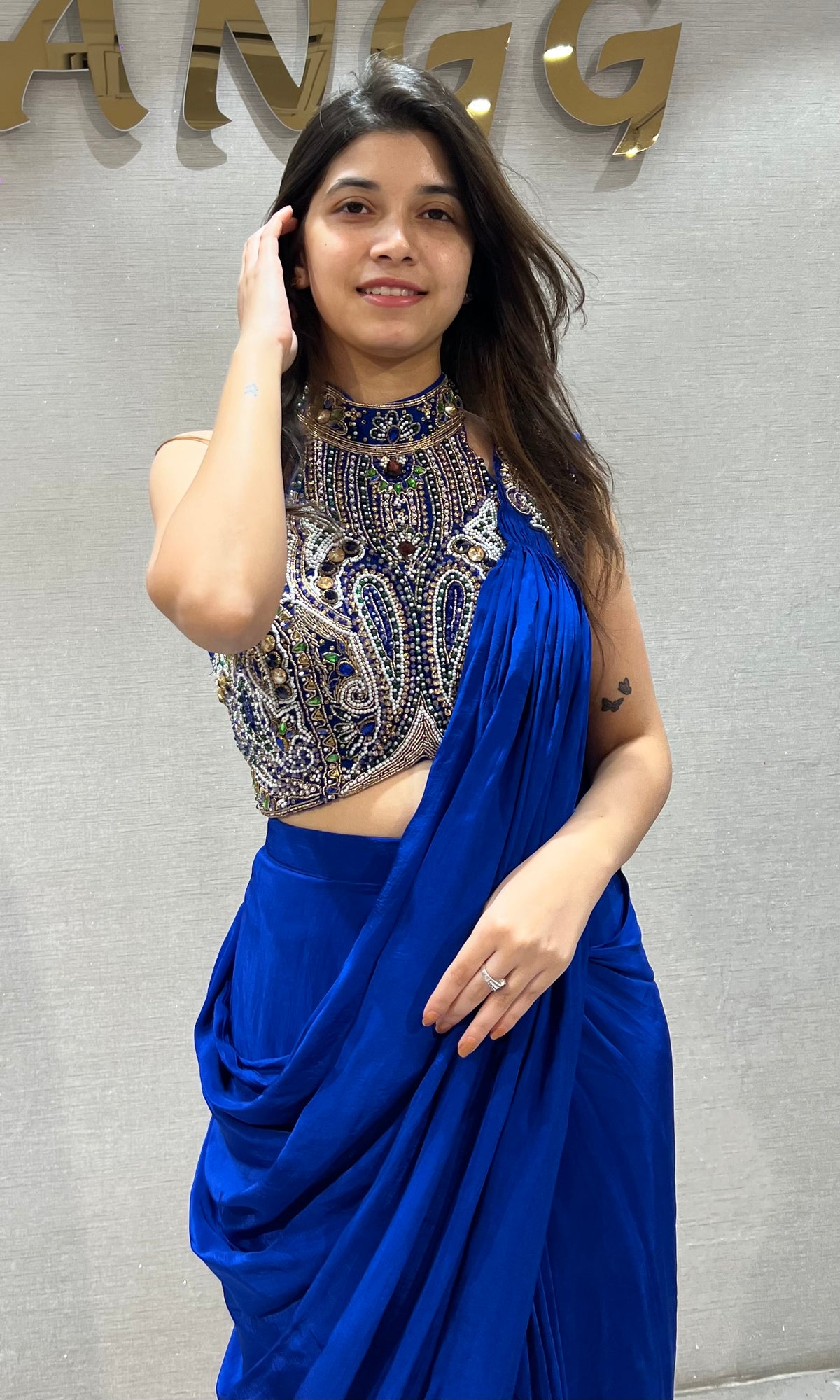 Royal blue draped saree with Crystals & Beadwork Halter blouse