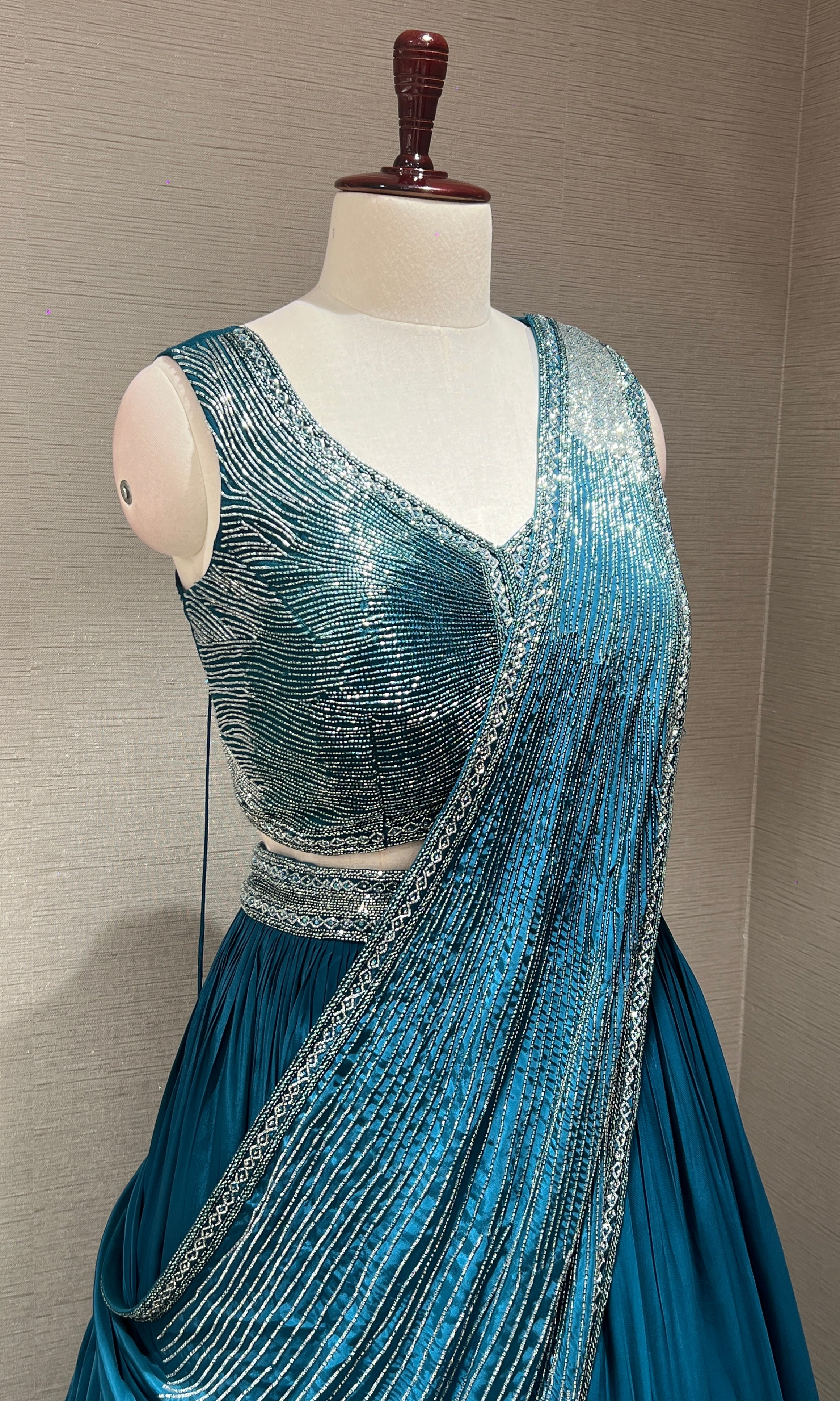 Peacock green Lehenga with draped sequins Pallu