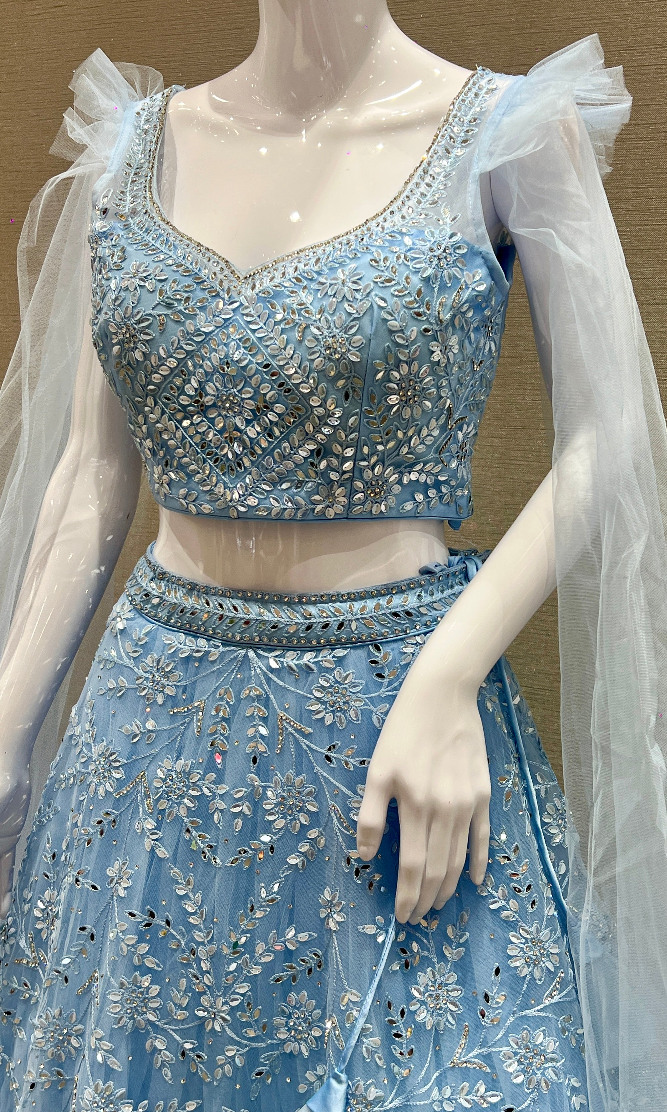 Aarvi β Sky Blue Net Embroidered Lehenga Set