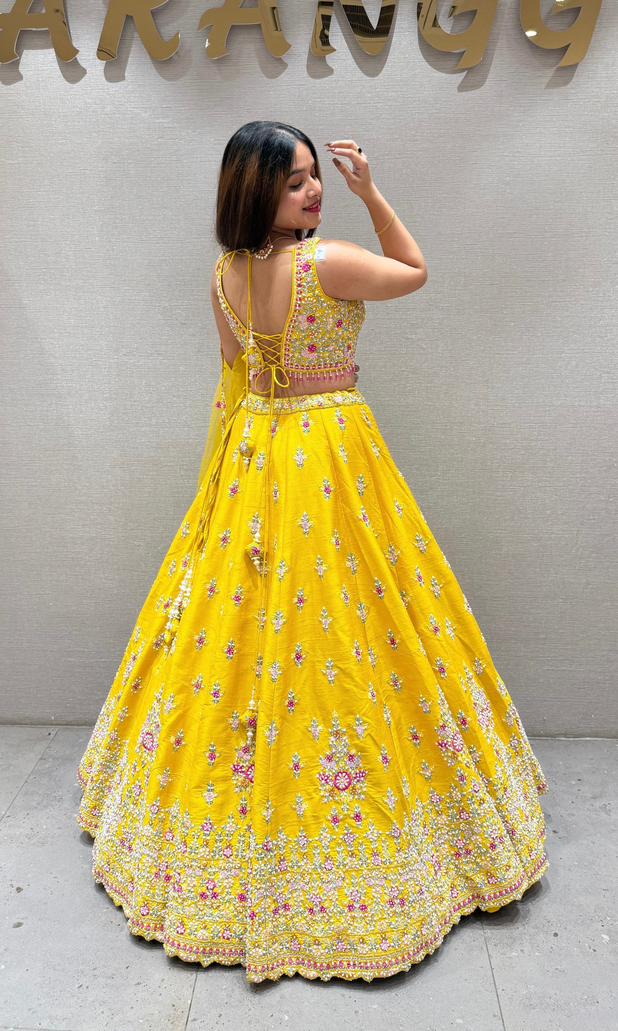 Yellow Lehenga with itricate embroidered