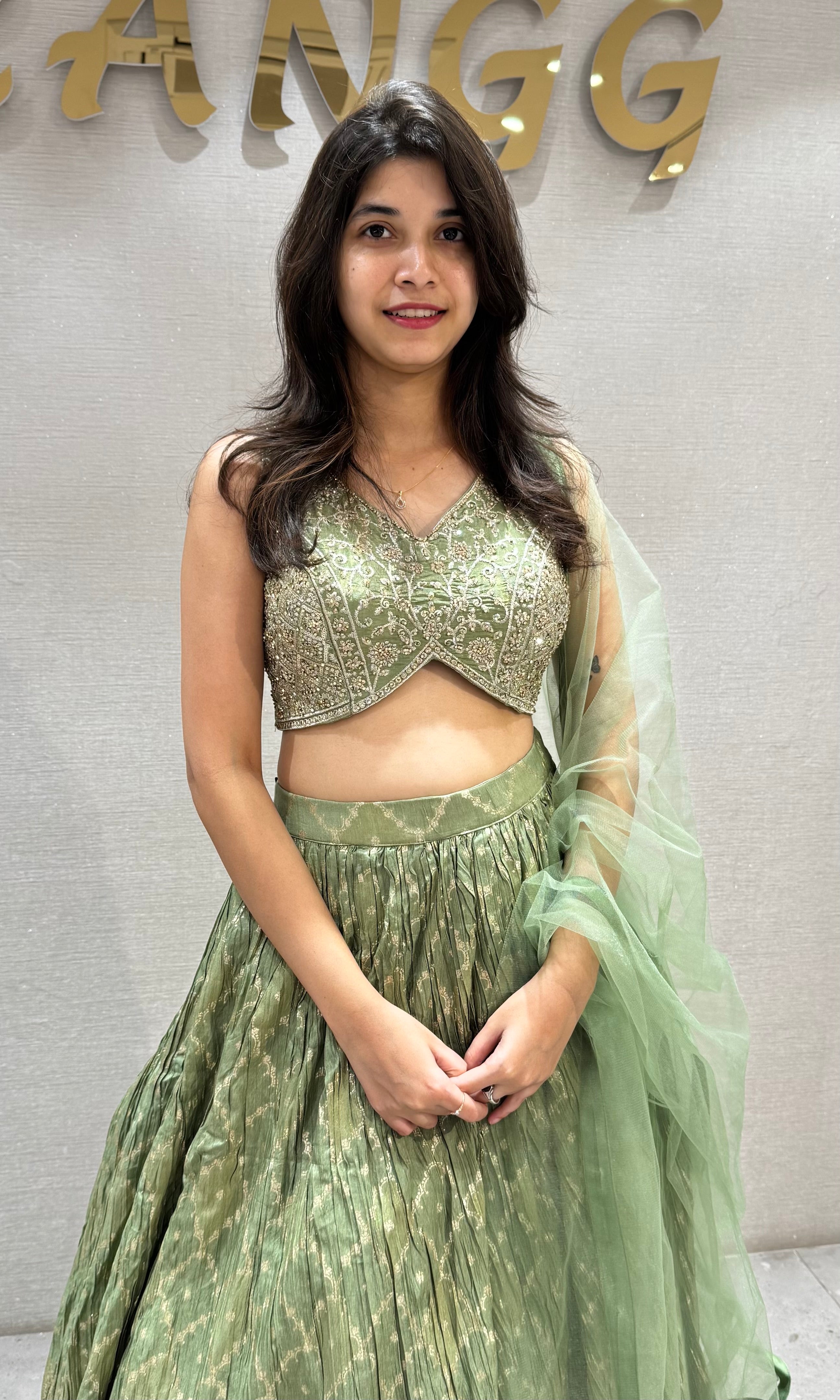 Pista Green Embroidered Net Lehenga Choli