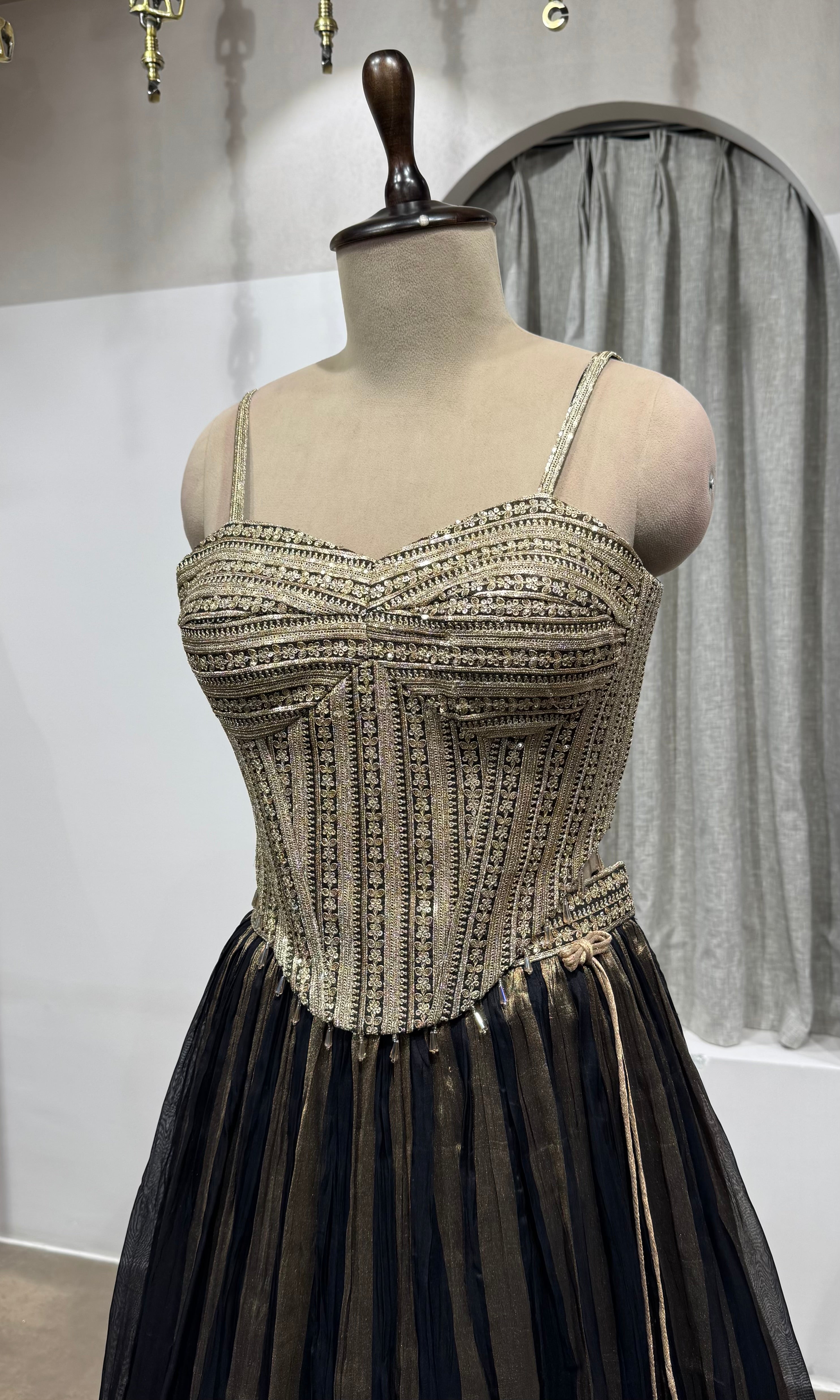 black and gold striped corset lehenga