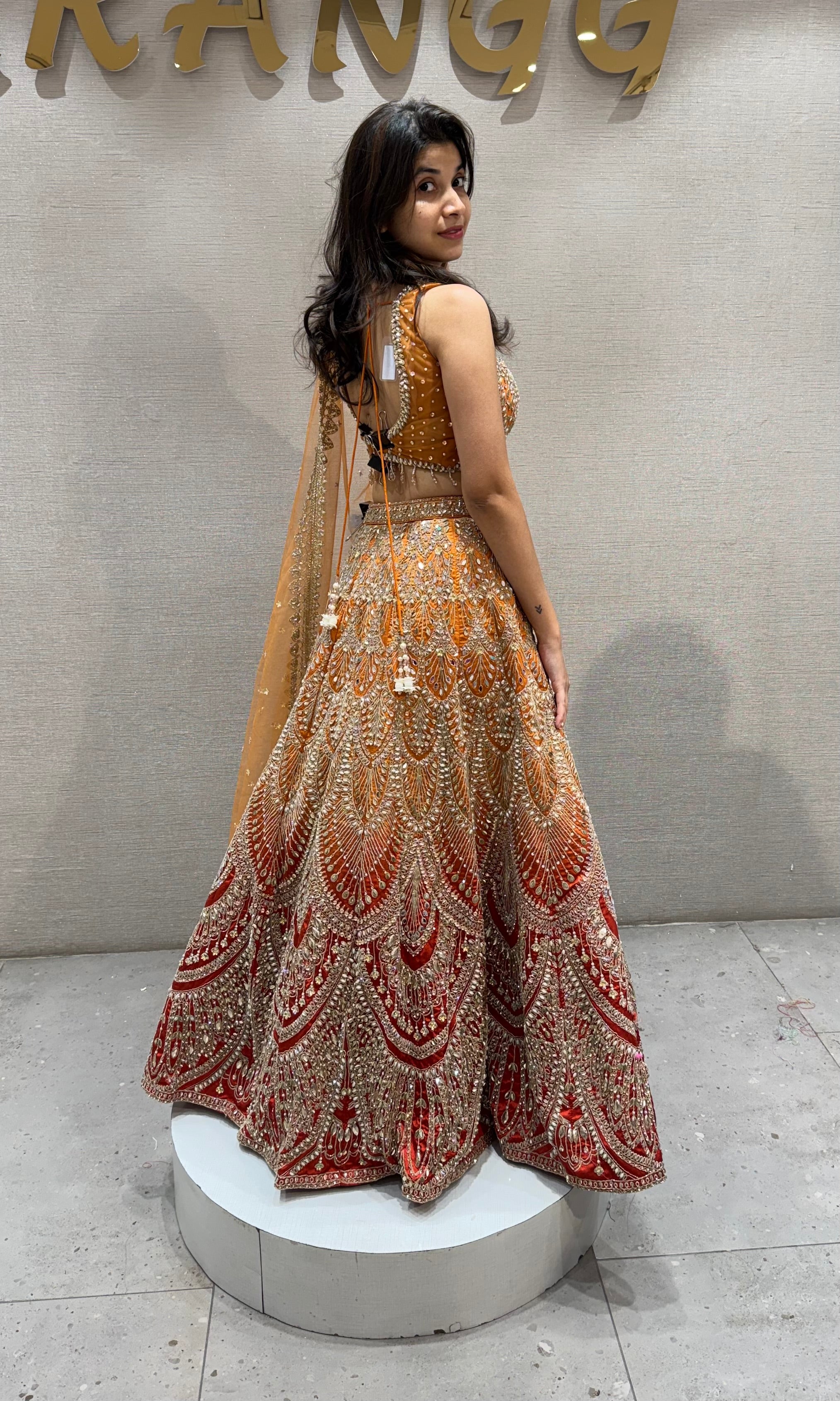 Ornate Rust and Gold Silk Lehenga Choli
