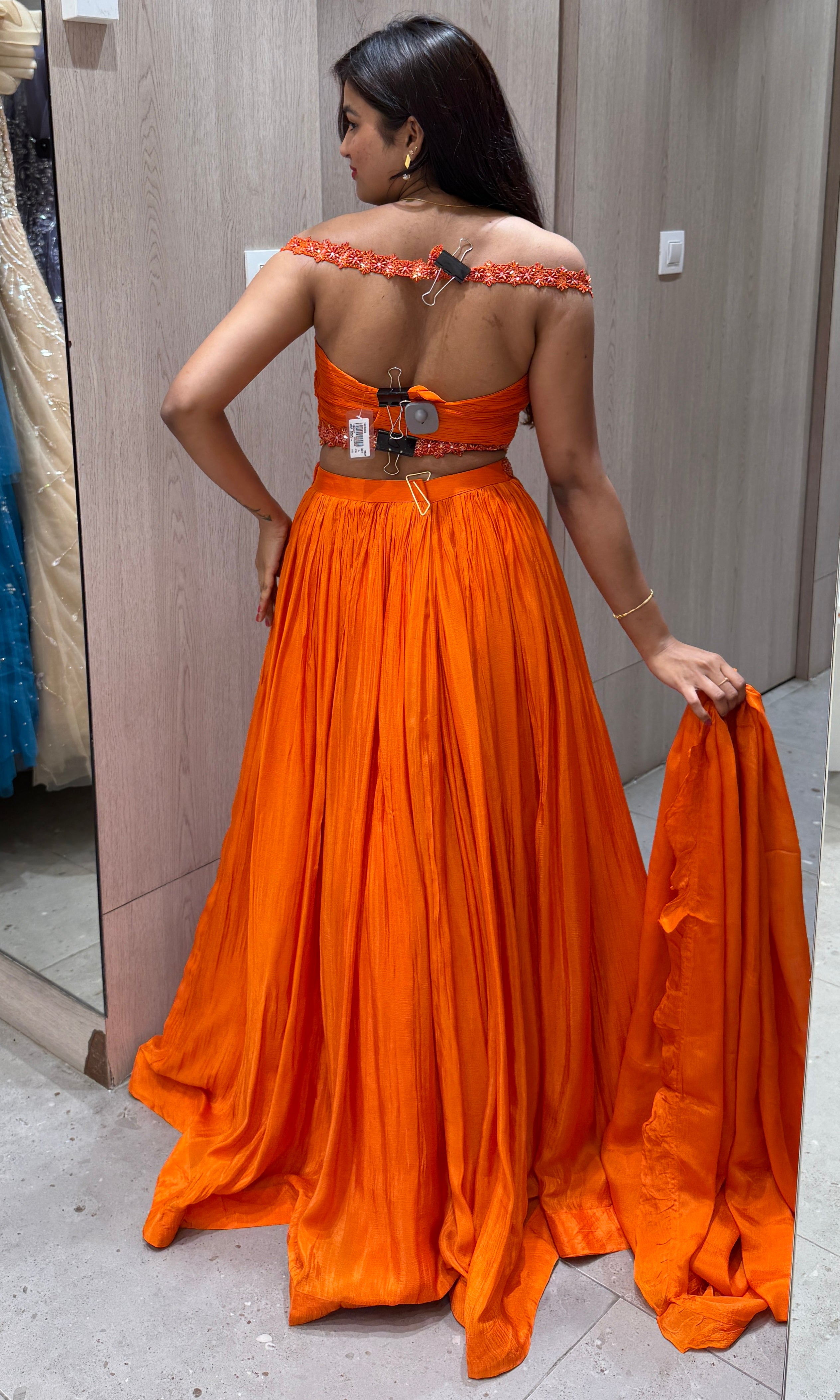 Orange lehenga with cold shoulder blouse 1000