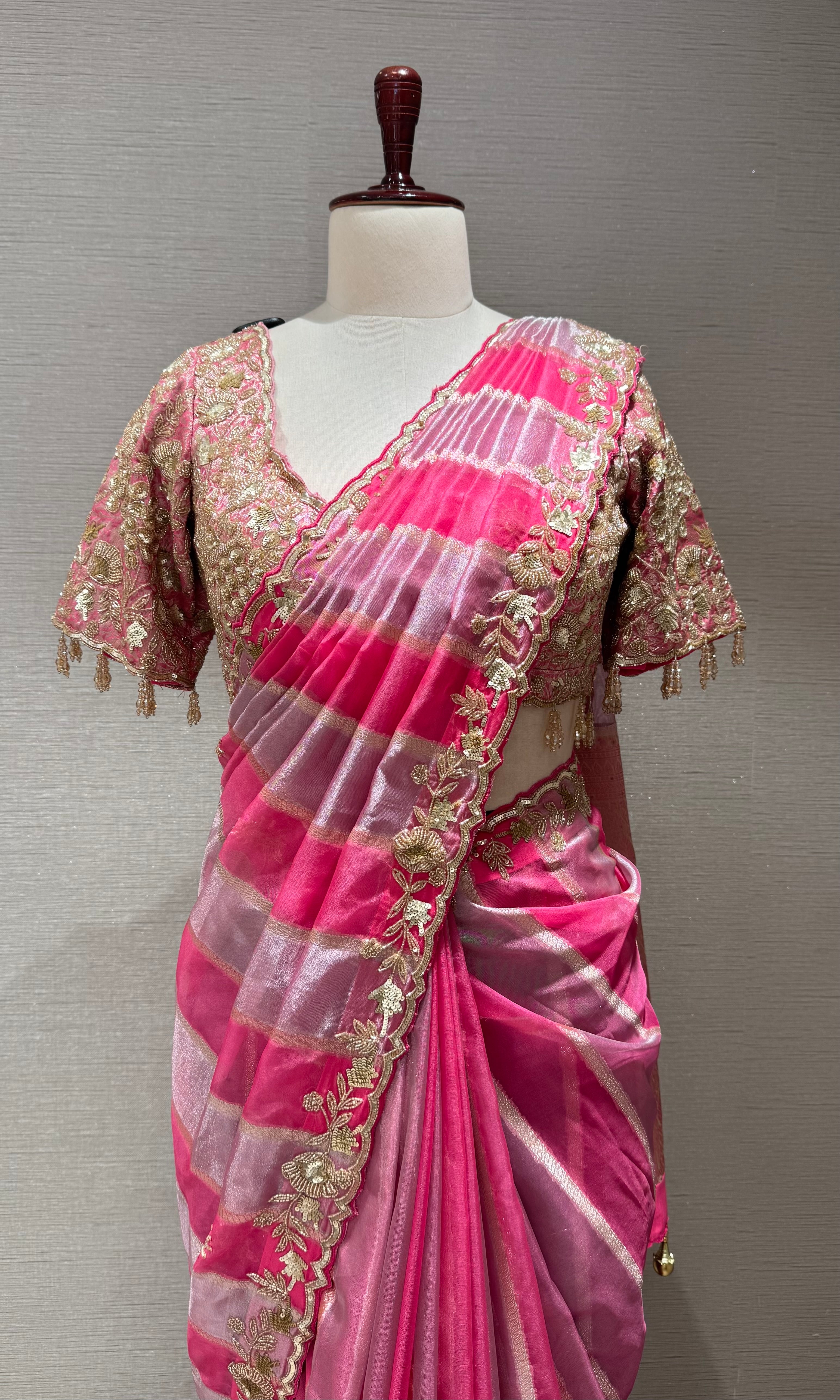 pink leheriya tissue saree with embellished blouse