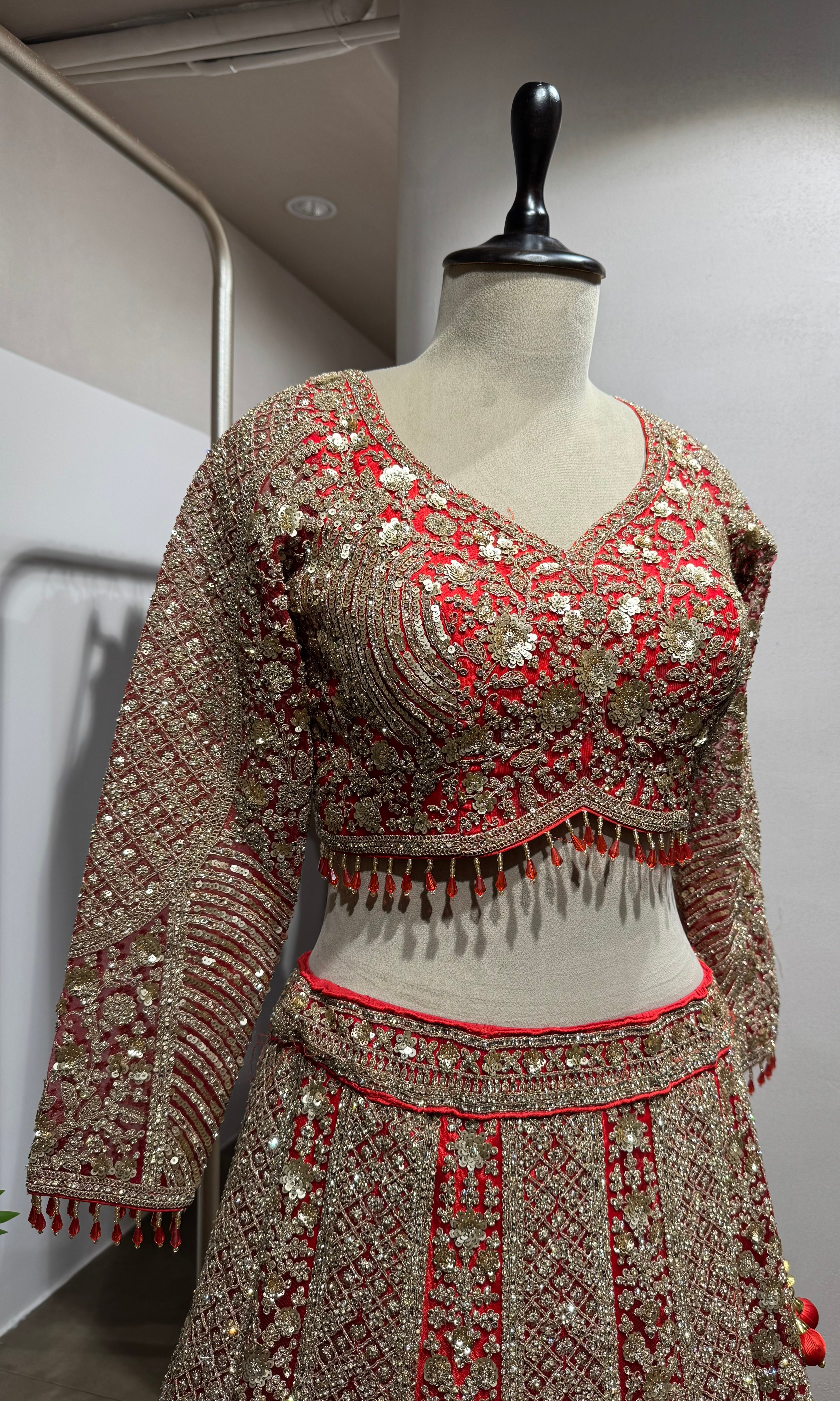 Red golden embroidery bridal lehenga