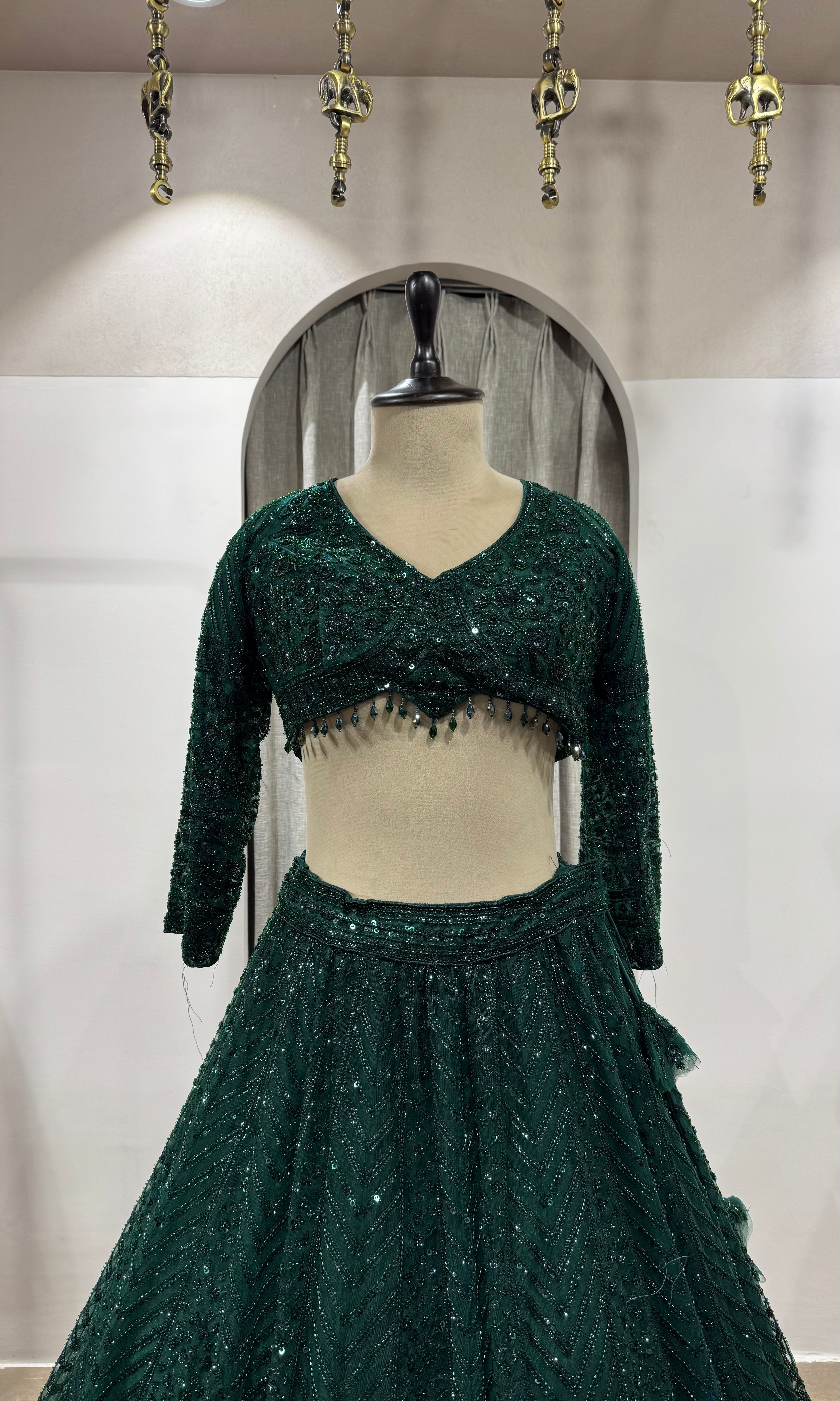 emerald green net lehenga choli