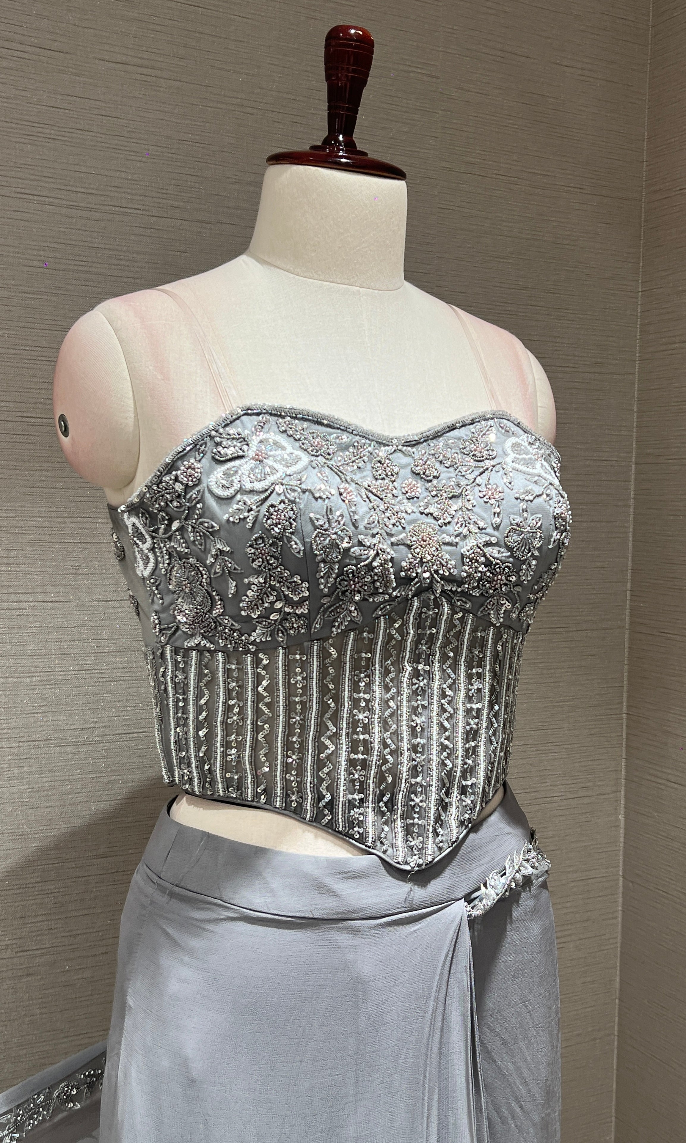 grey drape saree with embroidered corset blouse