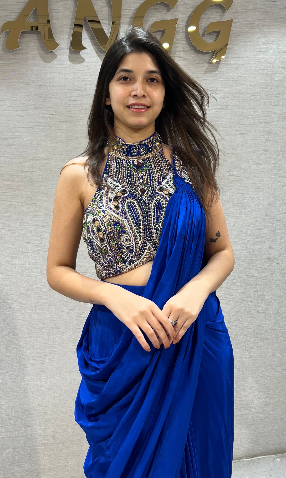 Royal blue draped saree with Crystals & Beadwork Halter blouse