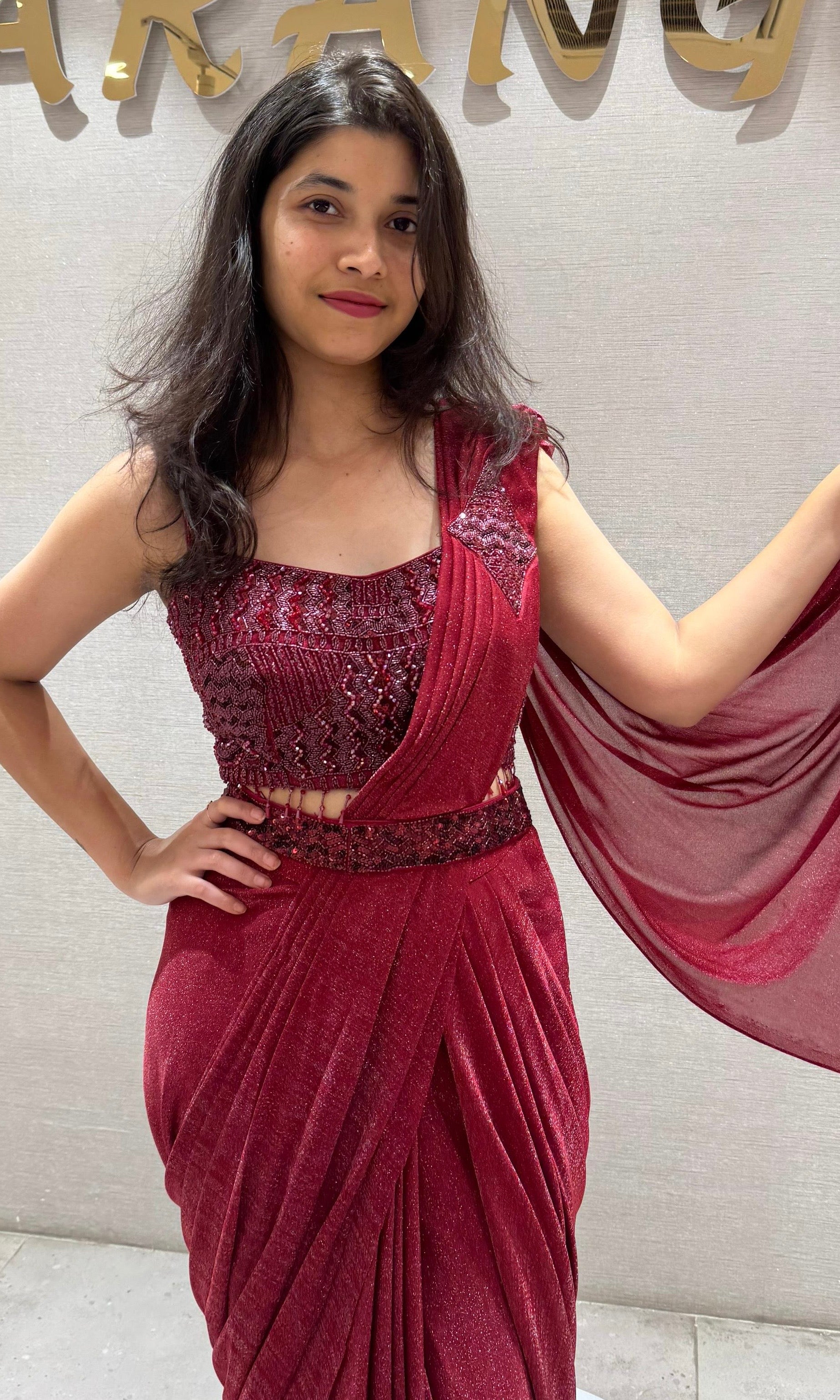 Maroon sequin embroidered drape saree