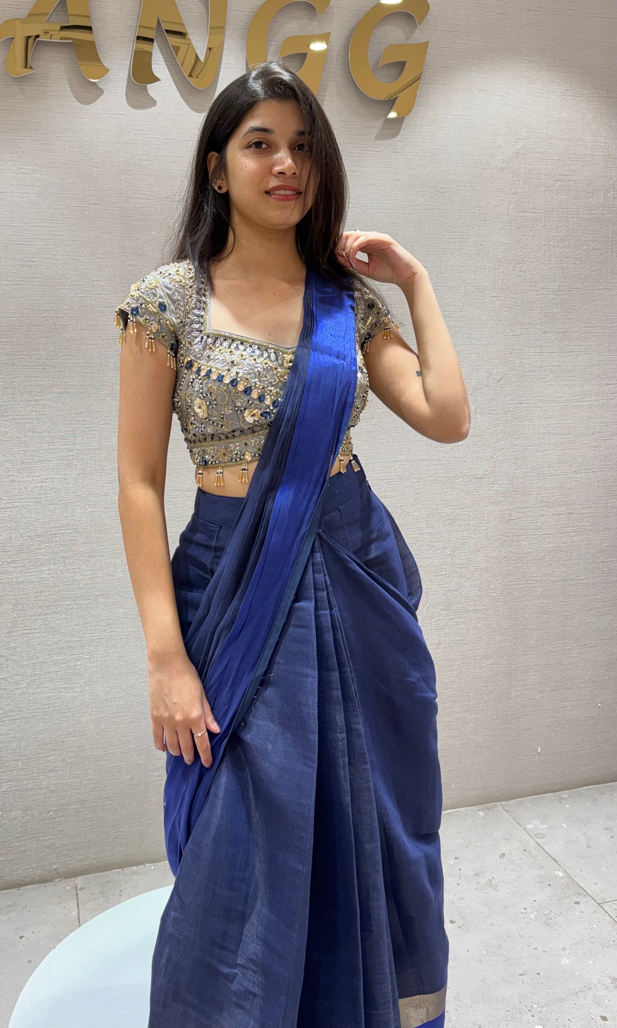 Blue Drape Saree with floral blouse
