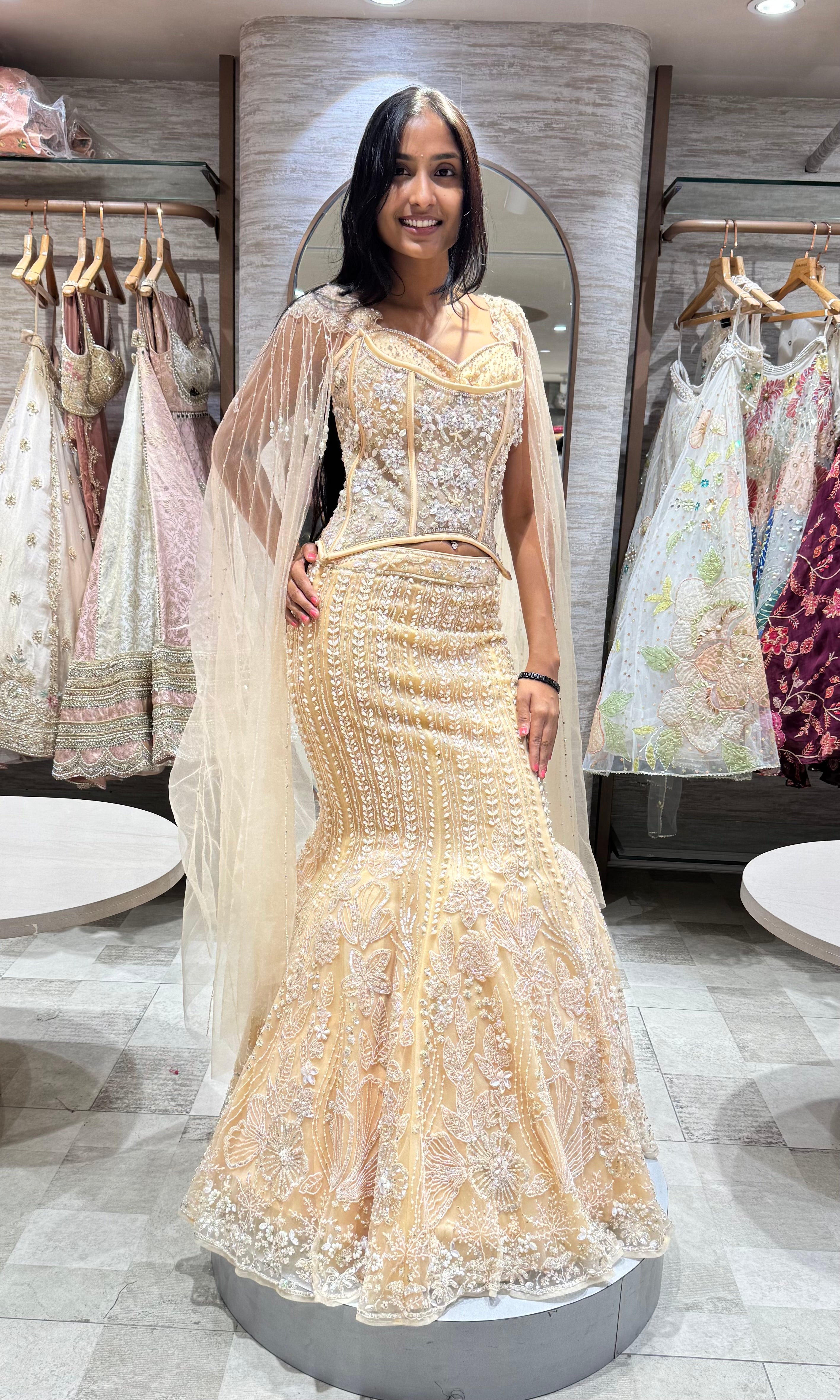 GOLD LEHENGA WITH CORSET BLOUSE & CAPE