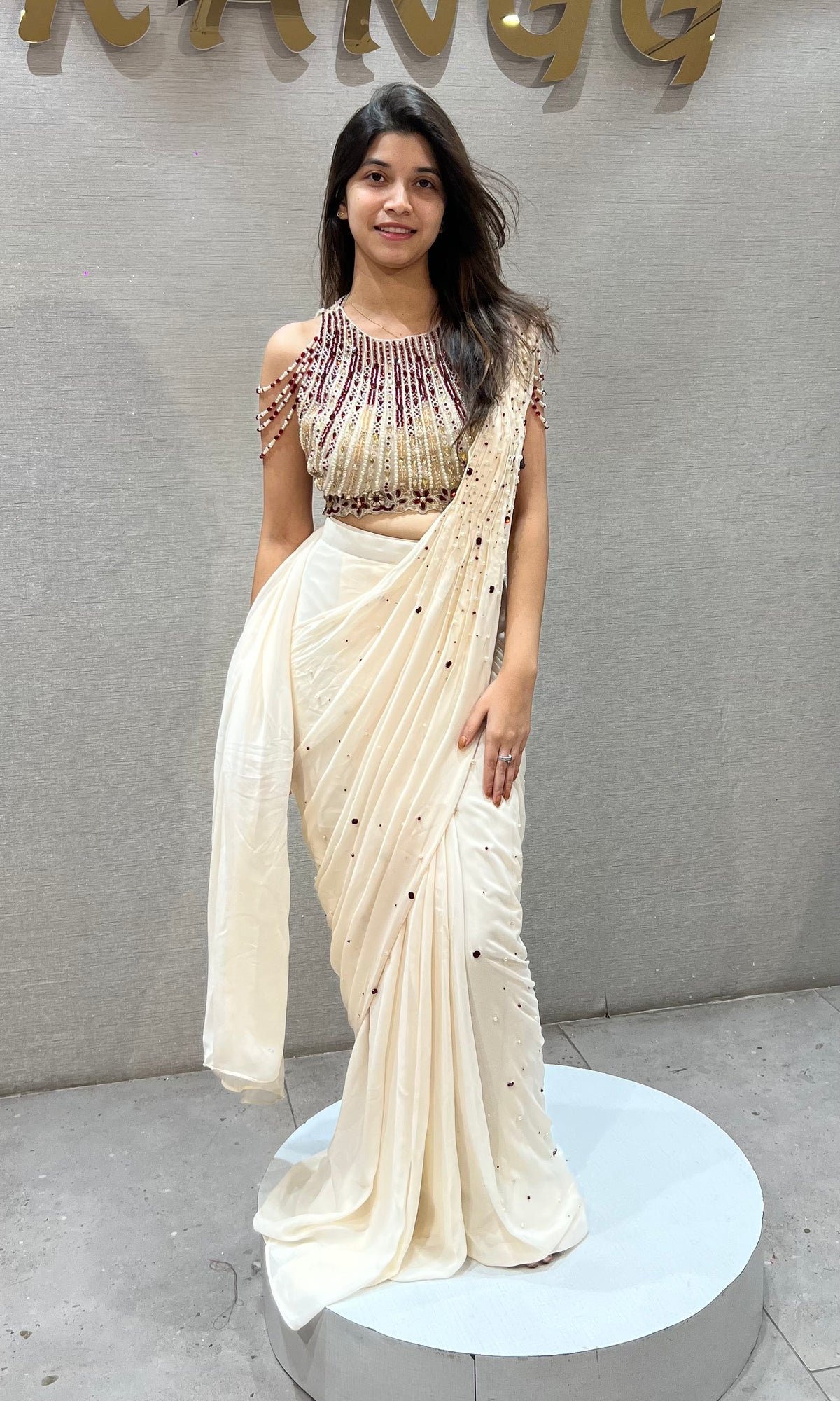 Cream Georgette Saree with Beaded Halter Blouse