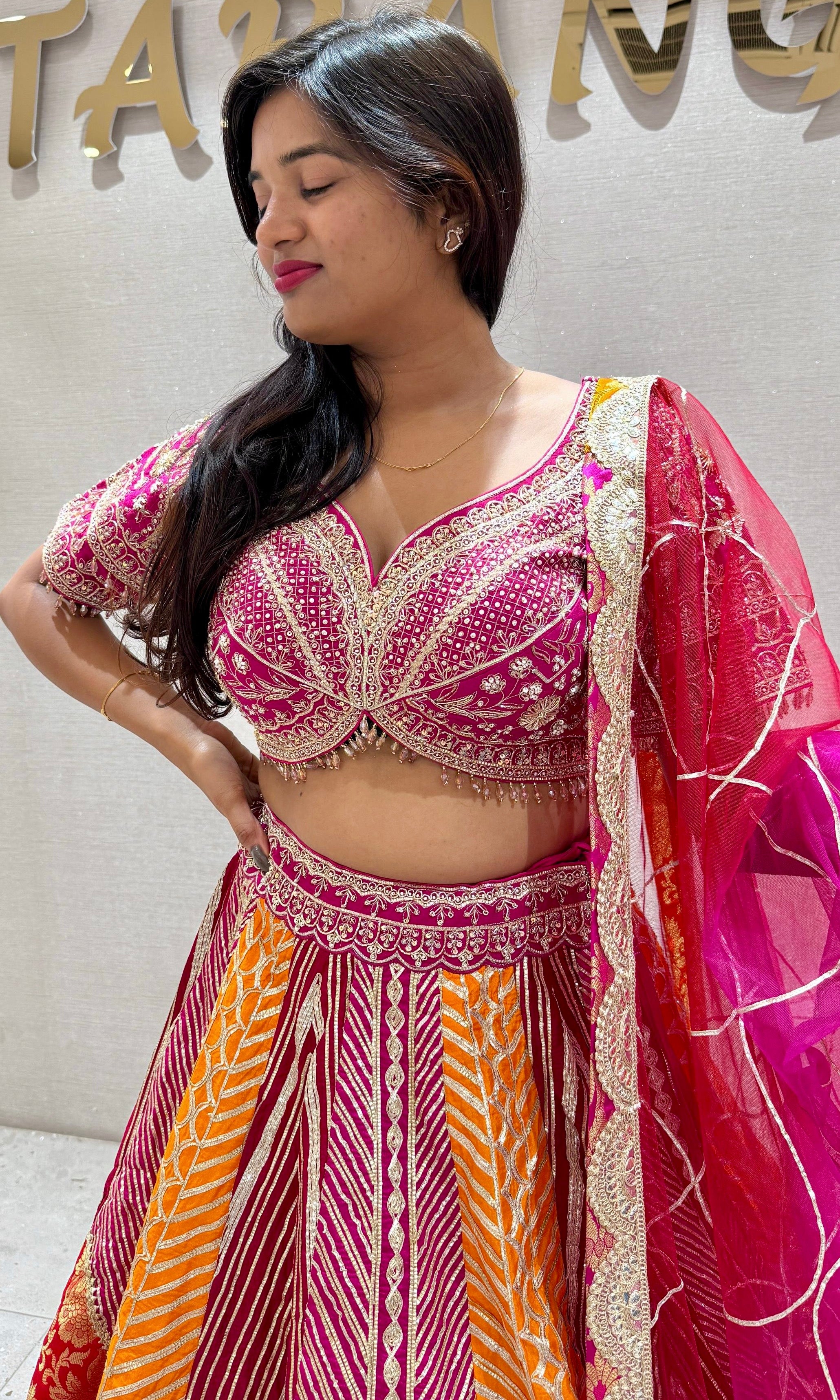 Pink and orange embroidered Lehenga