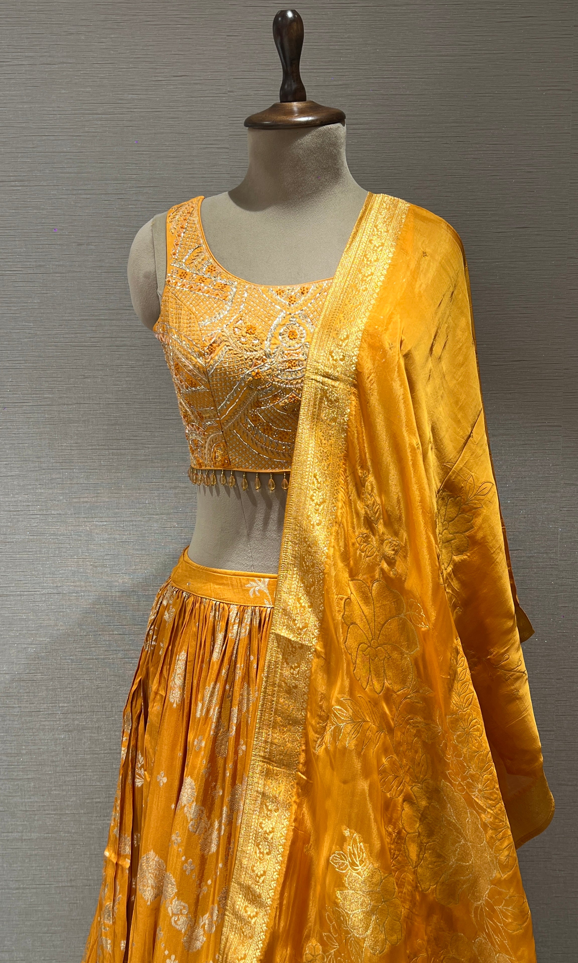 Elegant Yellow Lehenga with sheer dupatta