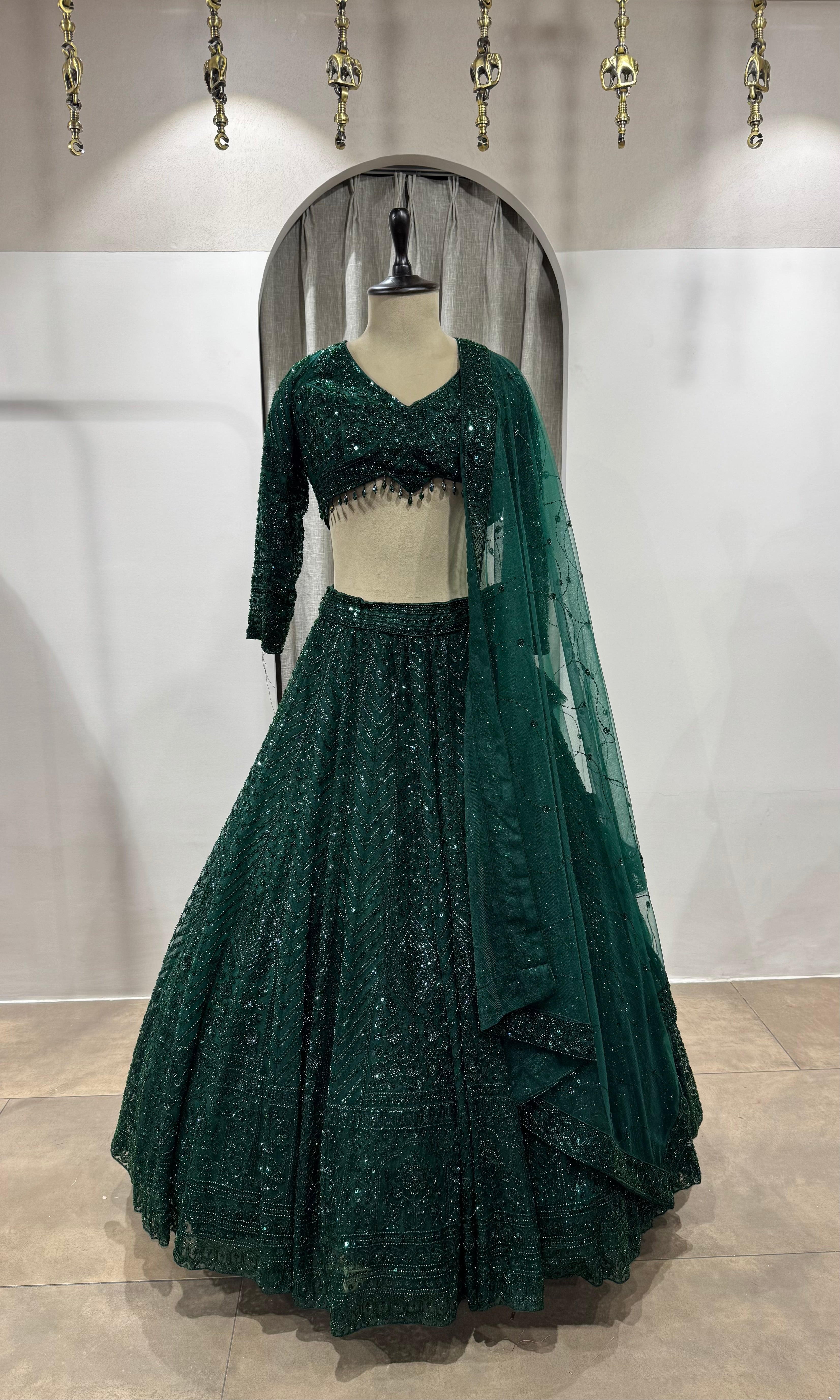 emerald green net lehenga choli