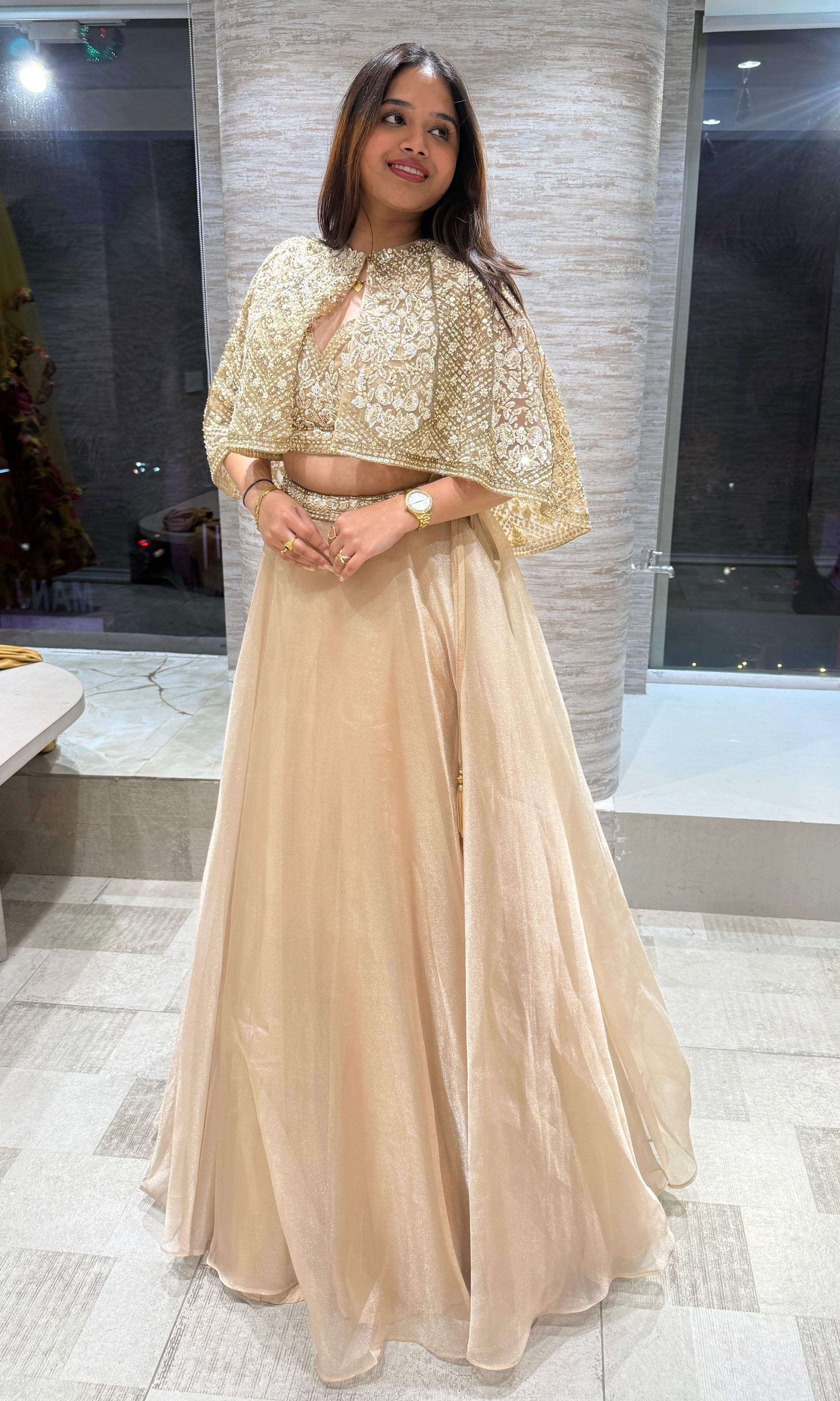 GOLD TISSUE LEHENGA WITH CAPE