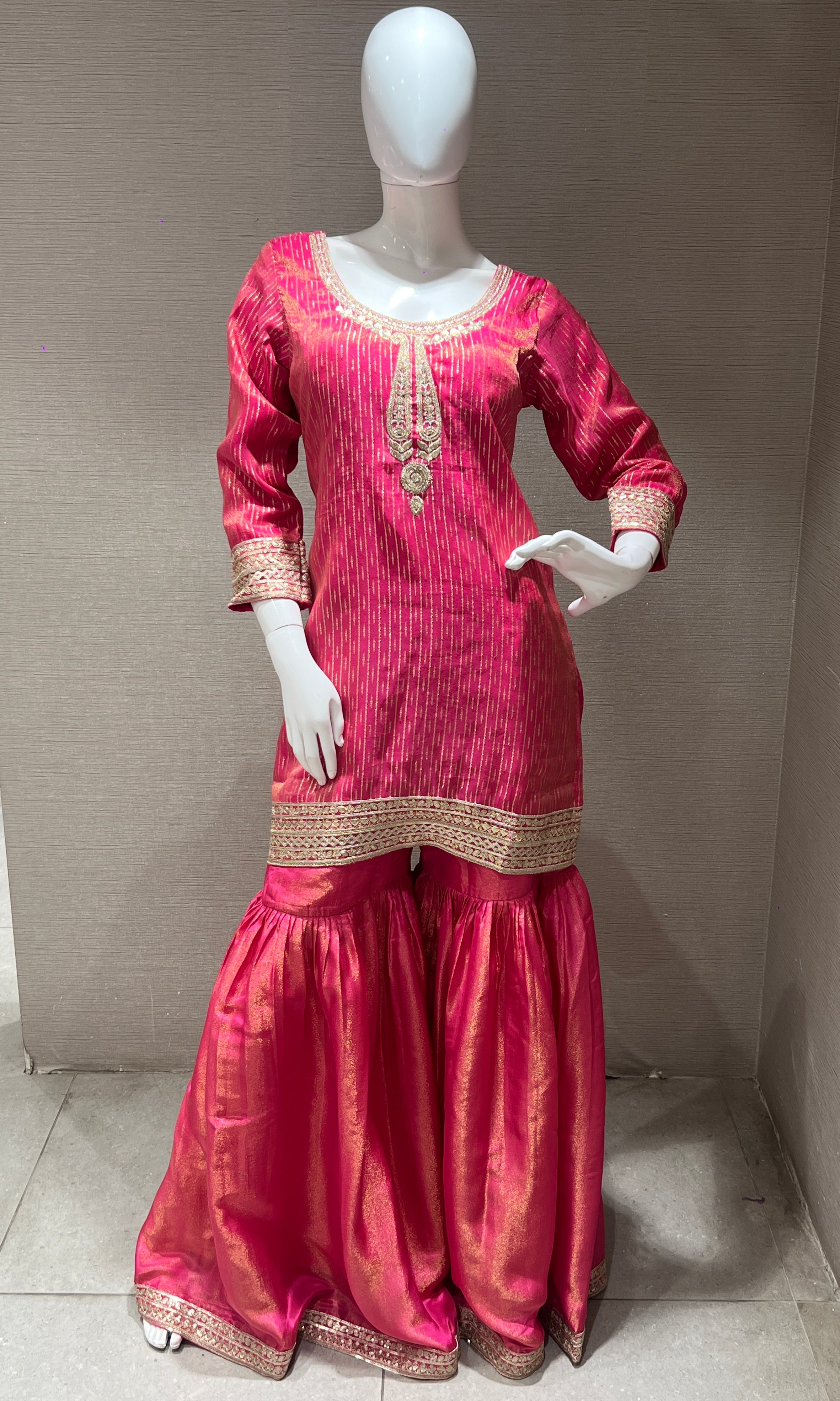 Pink gold embroidered sharara set with floral dupatta