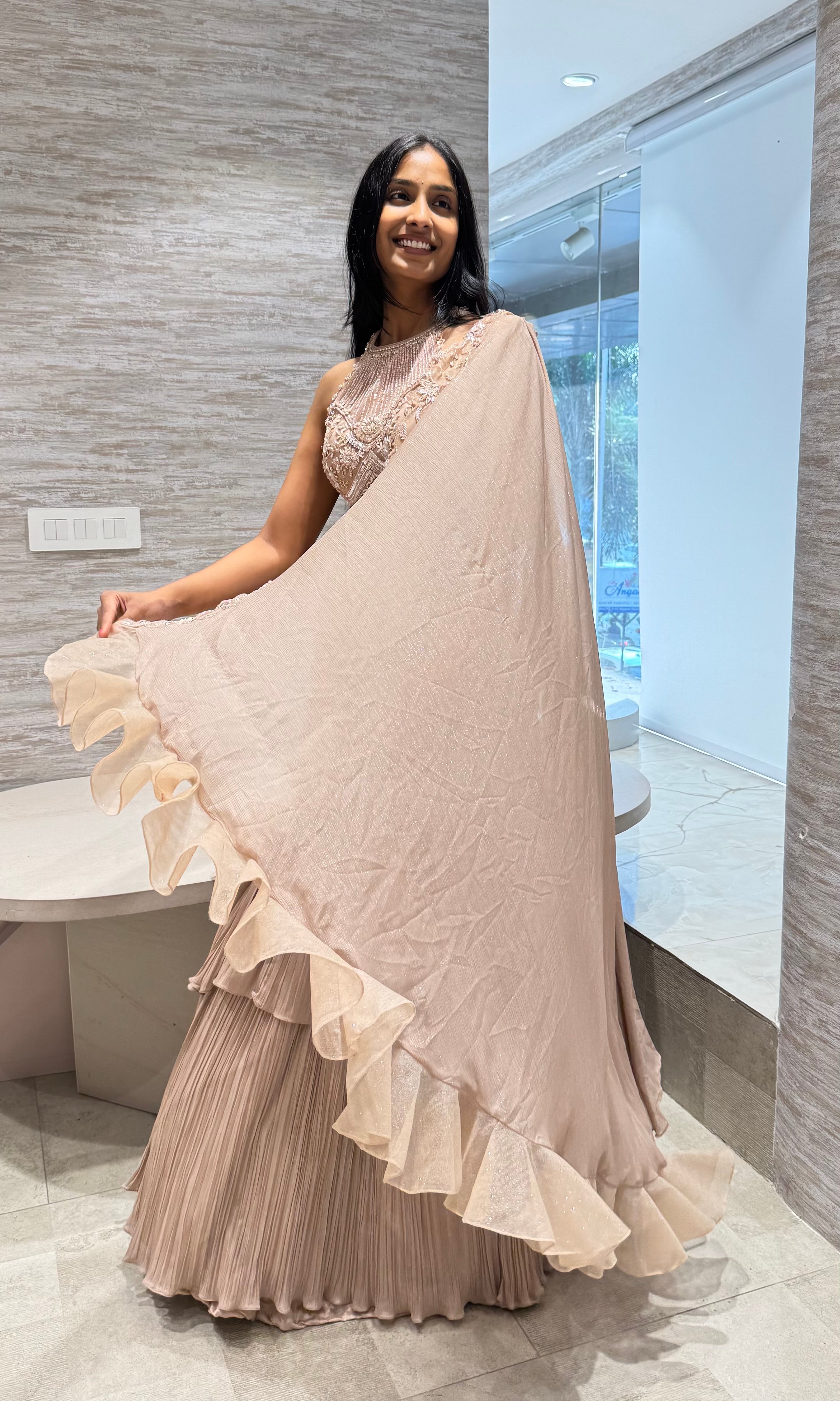 GOLD RUFFLE LEHENGA WITH HALTER NECK BLOUSE