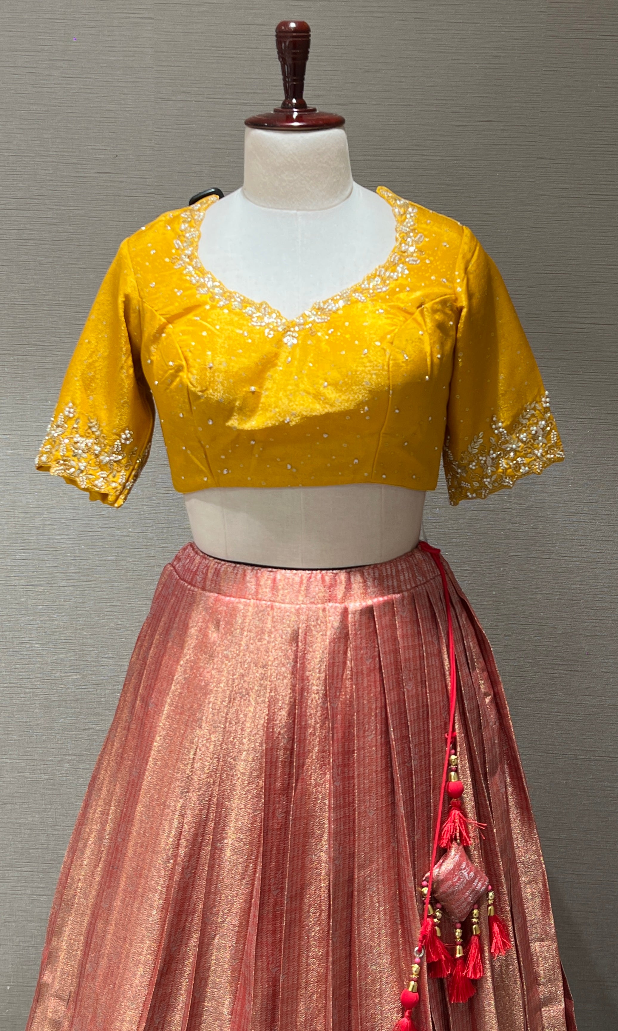 lotus pink lehenga with yellow blouse