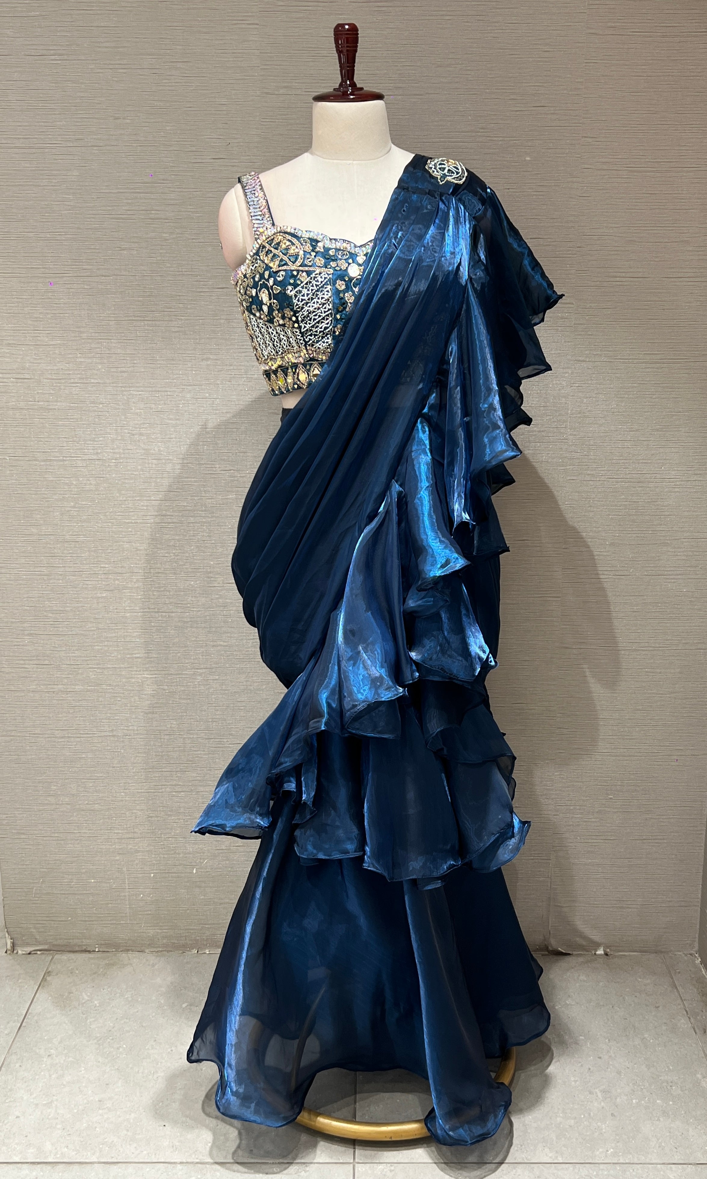metallic blue drape saree with ruffles
