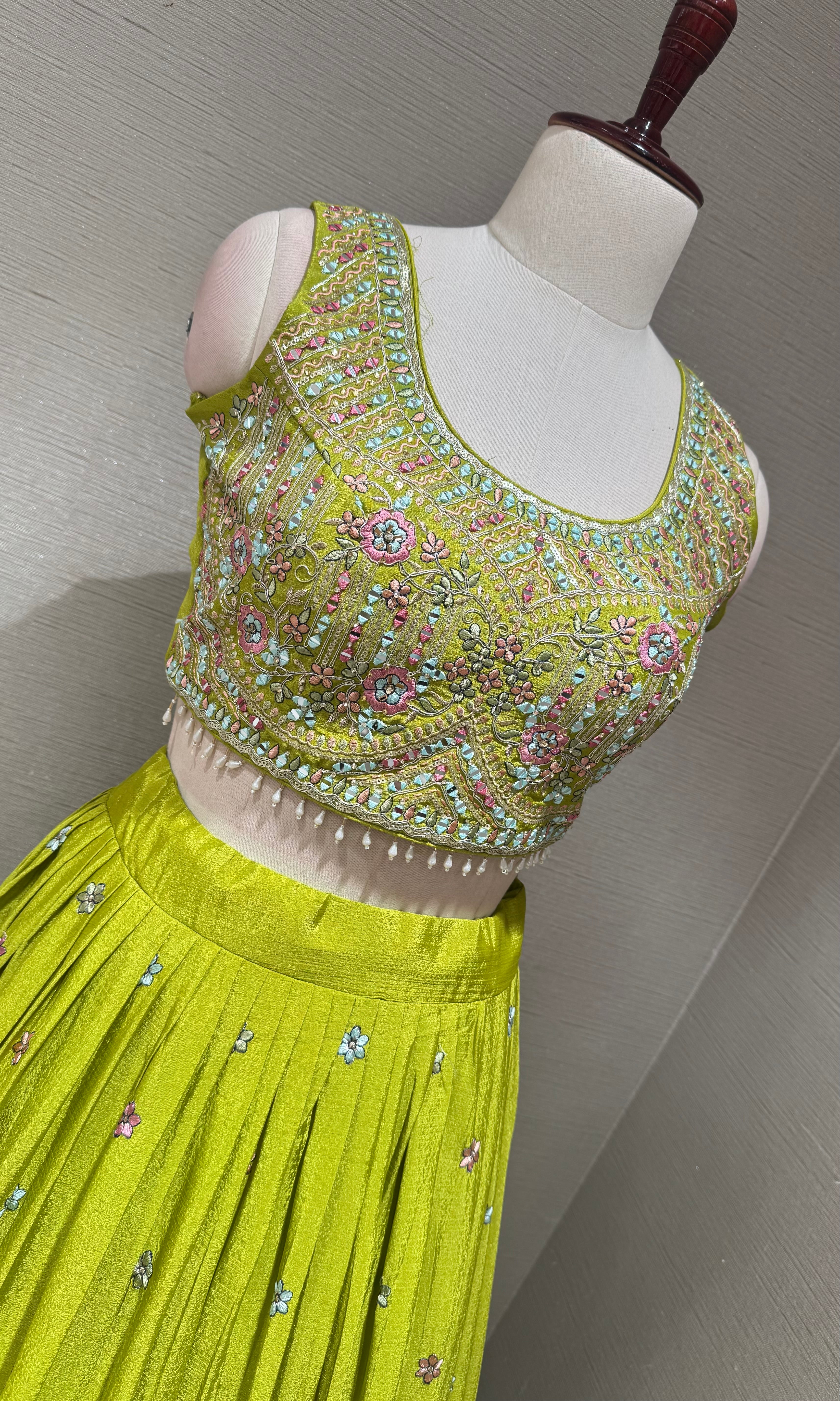 Green Tissue silk lehenga set with intricate floral embroidery