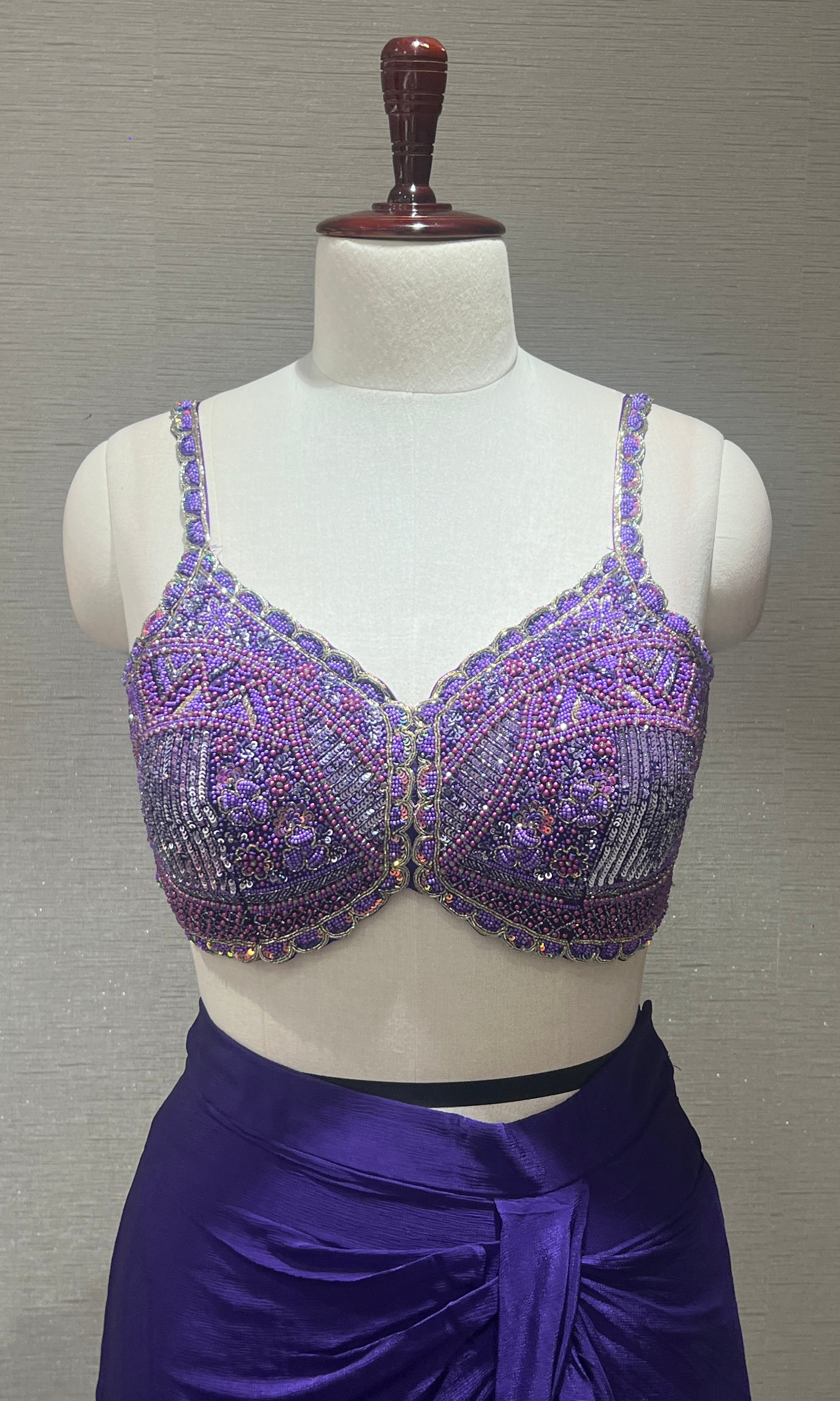 Purple drape saree with embroidered blouse