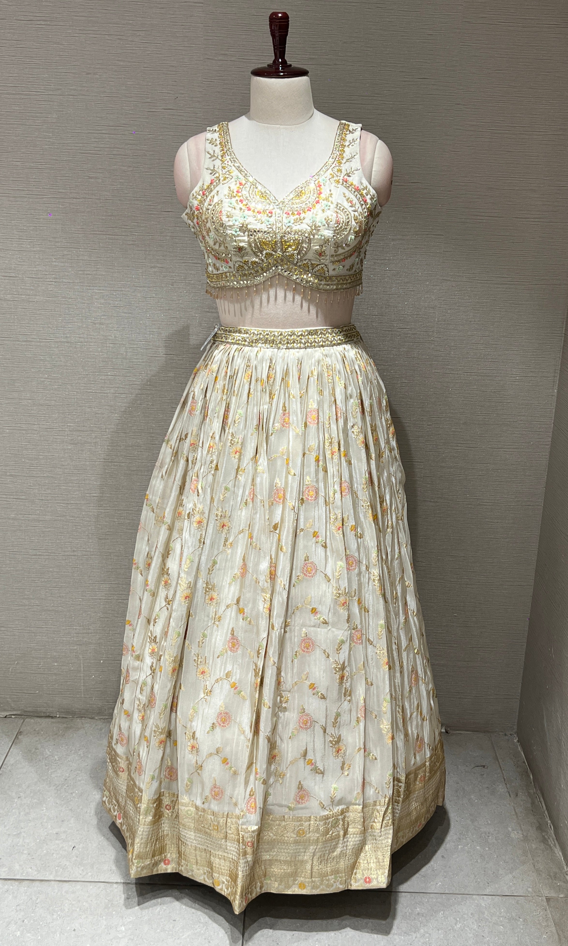 Half white Floral embroidred Lehenga with Golden Border