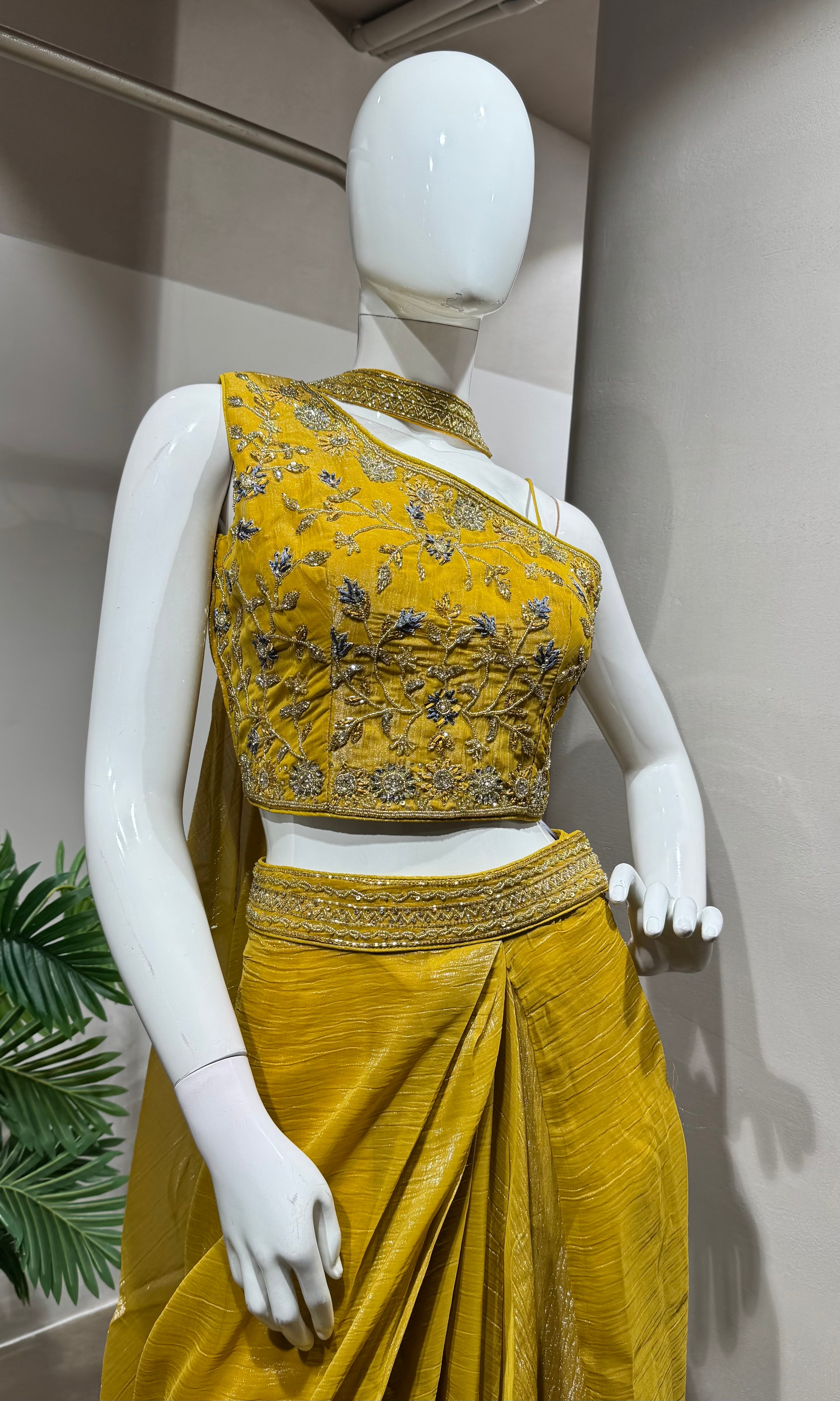 mustard draped skirt with embellished blouse