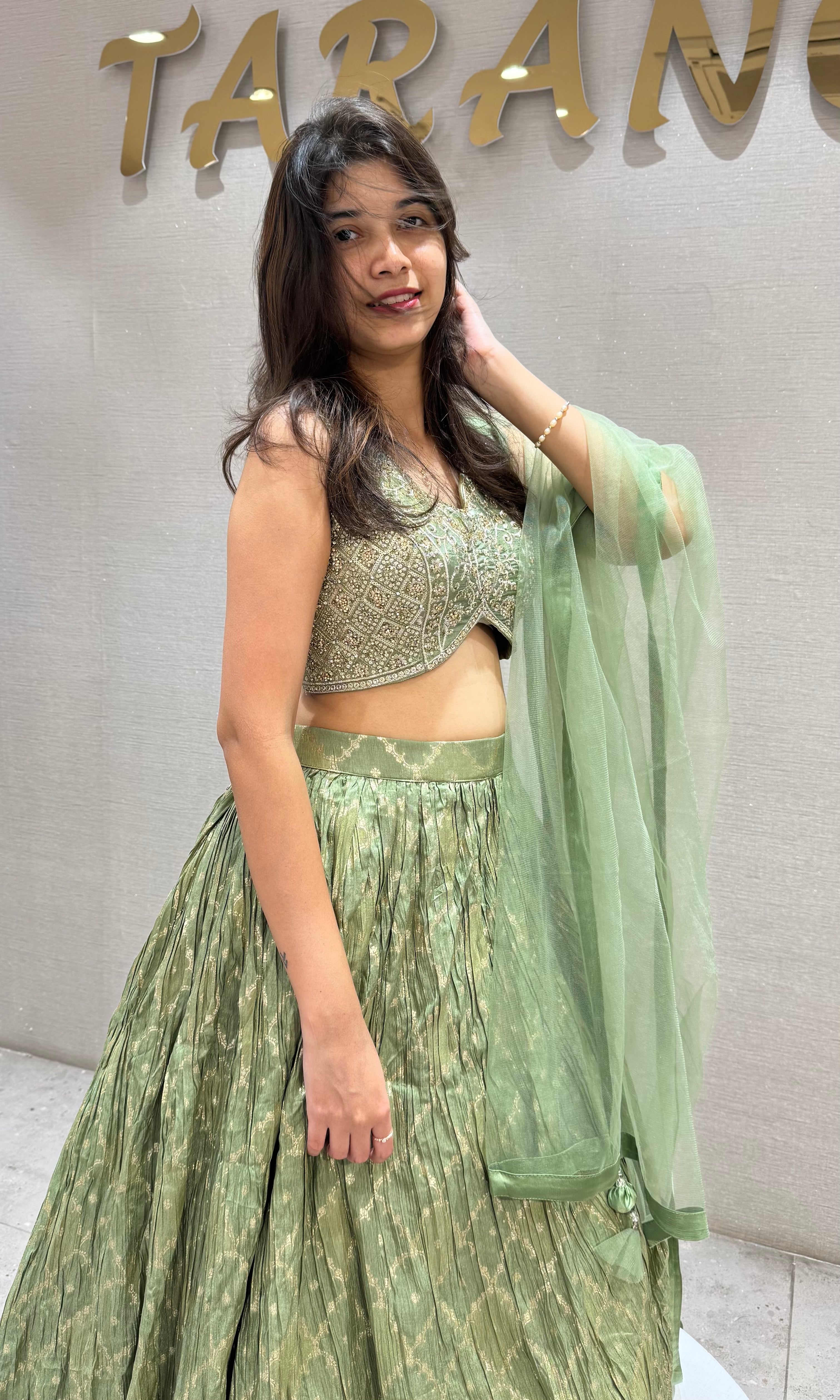 Pista Green Embroidered Net Lehenga Choli