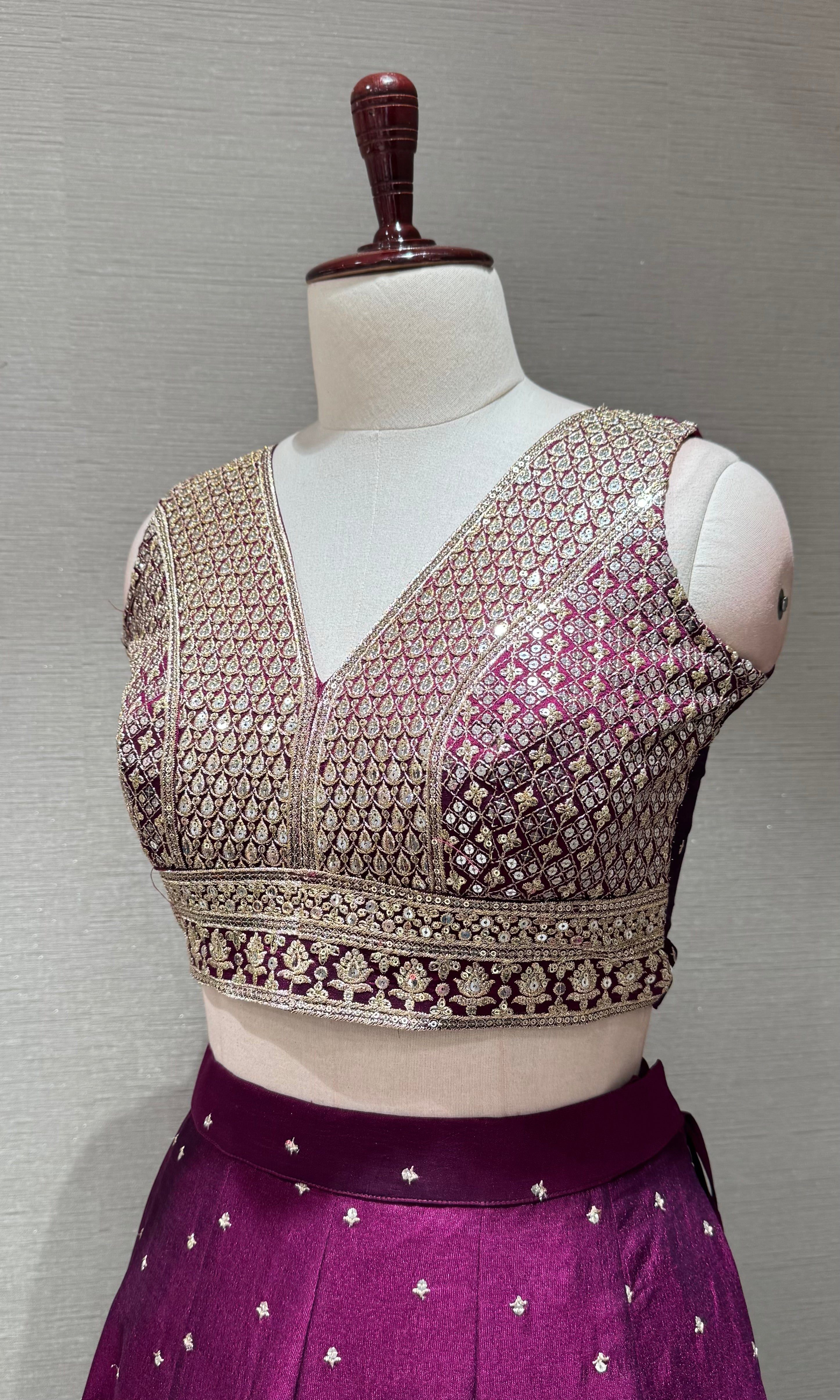Wine and gold embroidered Lehenga Choli