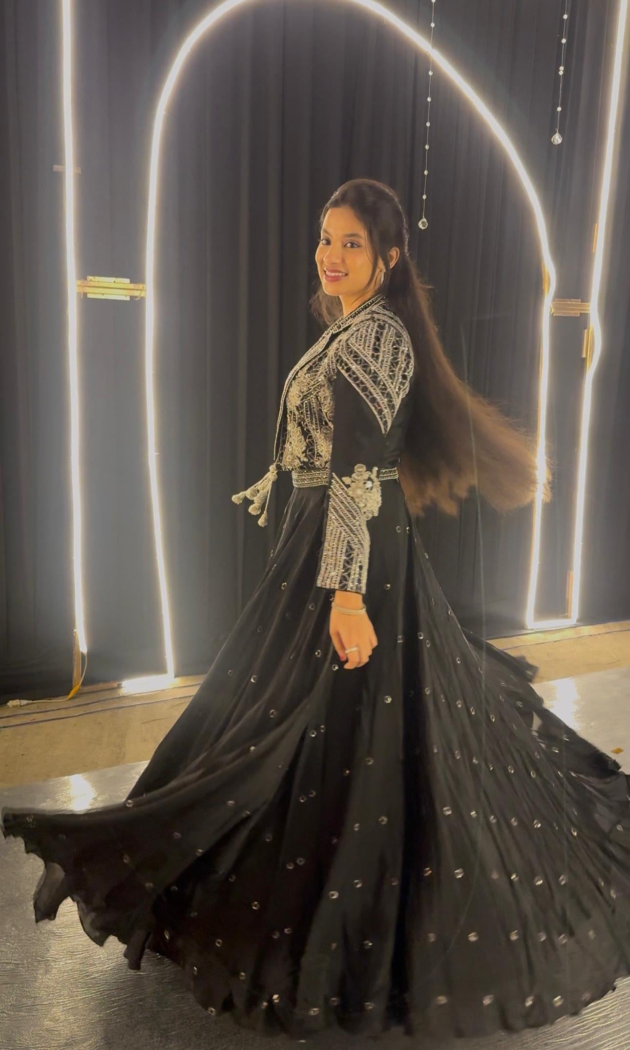 Black lehenga with corset blouse and jacket