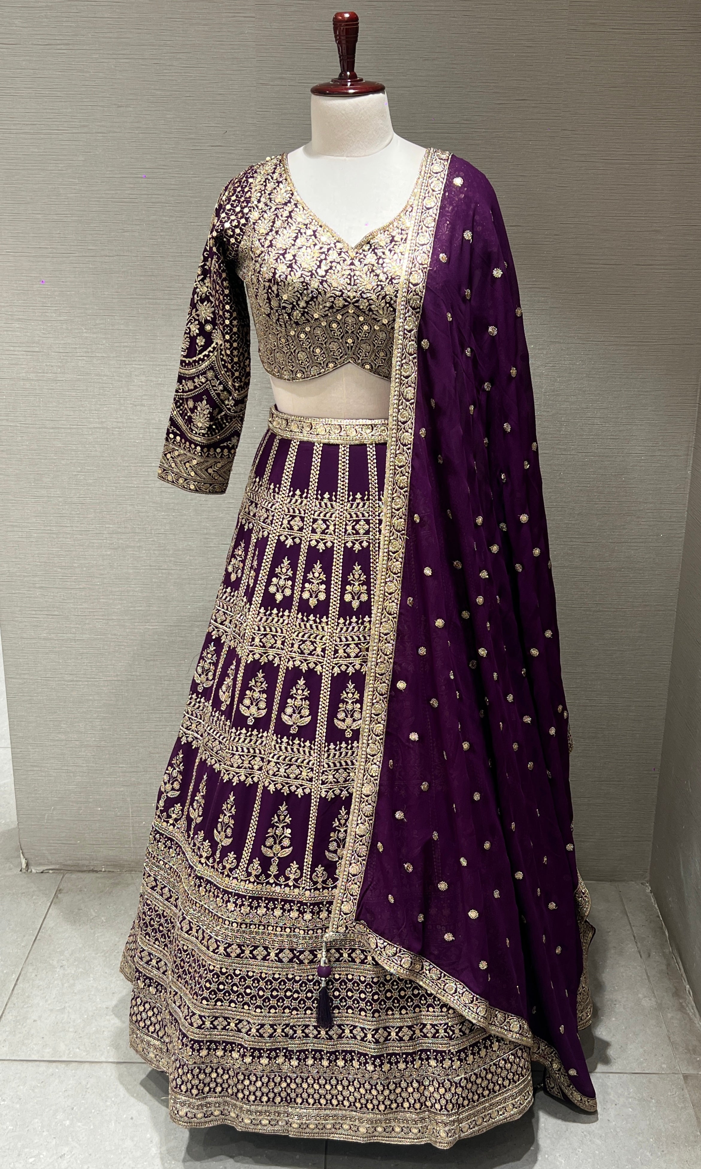 Gold Embroidery lehenga in wine shade