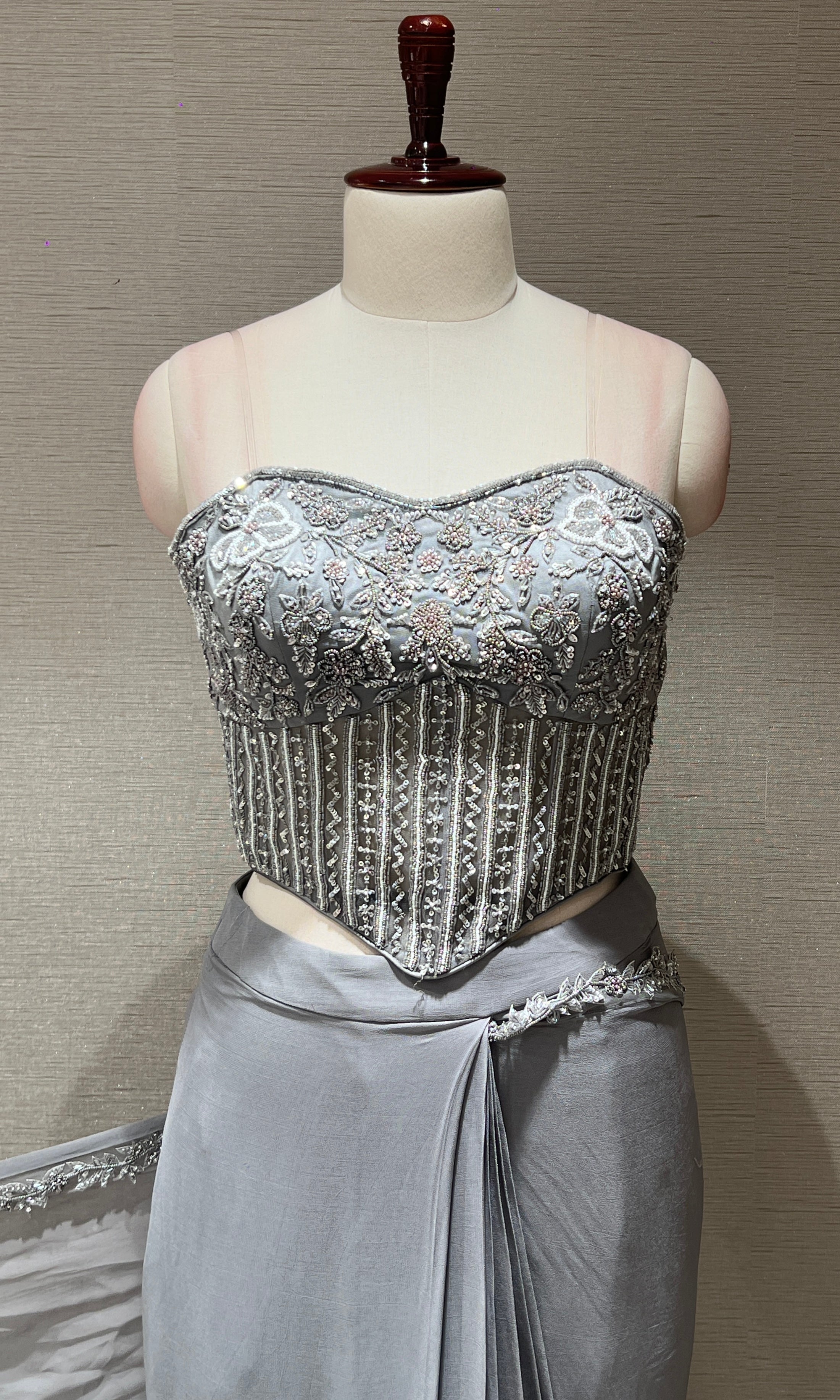 grey drape saree with embroidered corset blouse