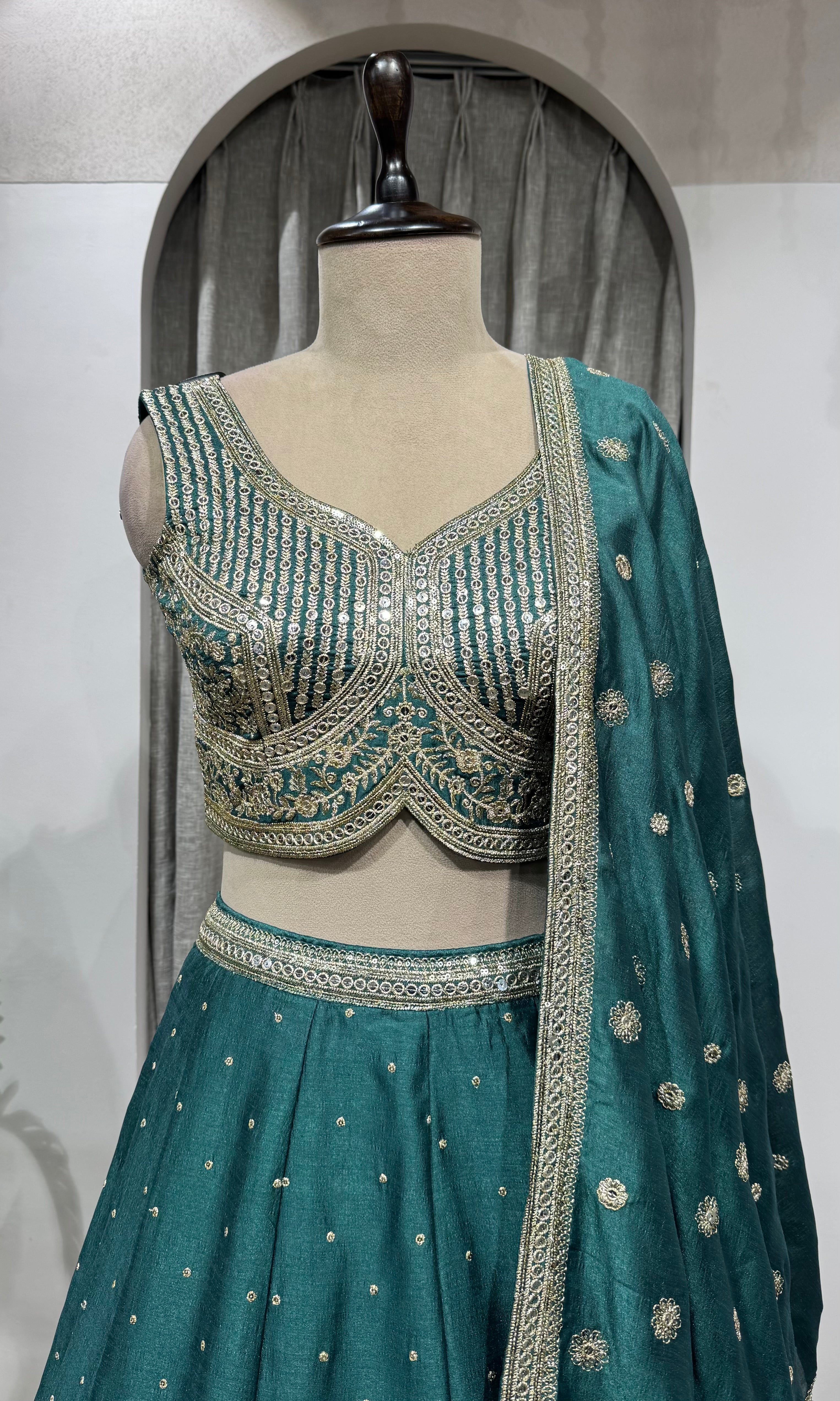Green silver and gold embroidery lehenga set