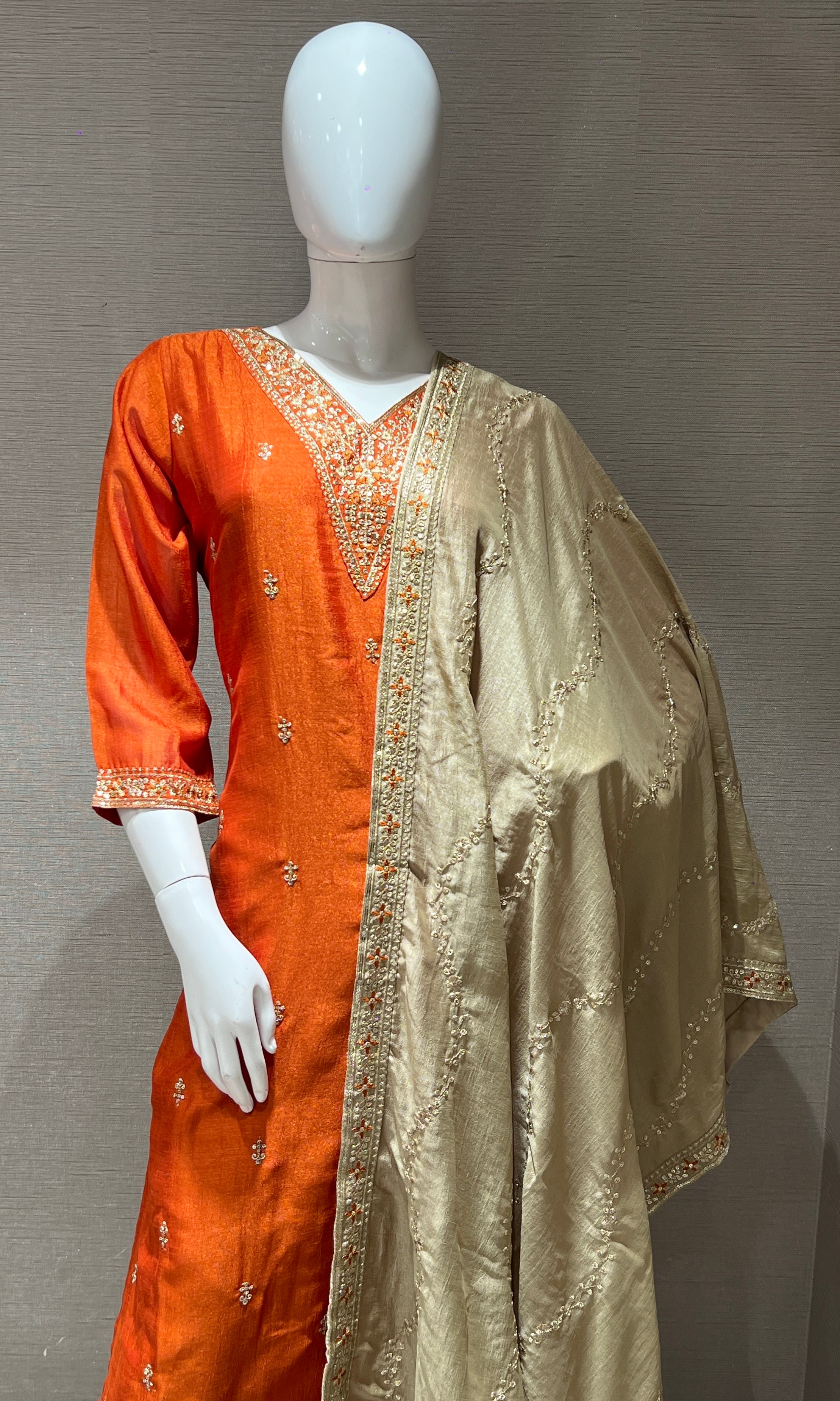 orange kurta set with contrast gold duppatta