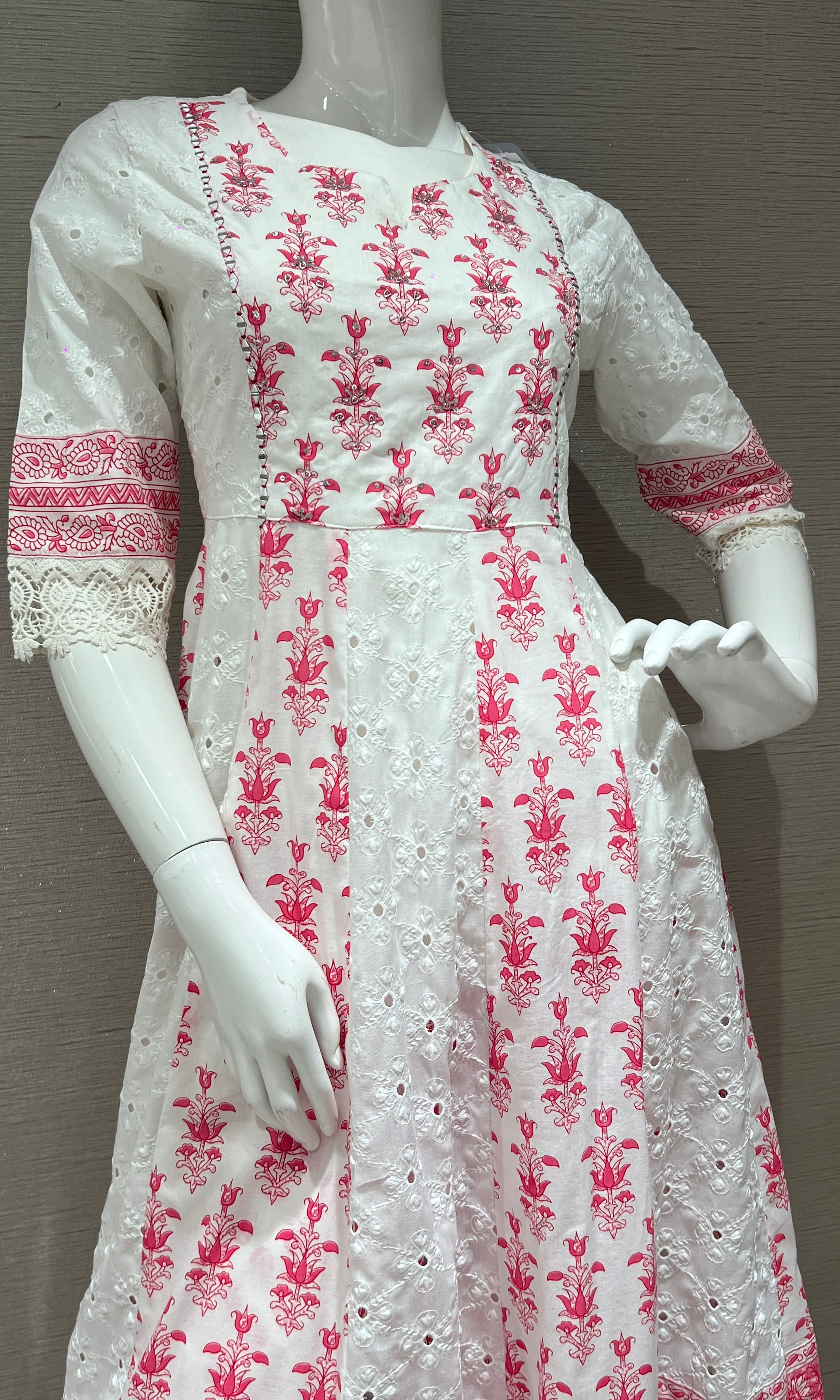 white and pink printed kurta set