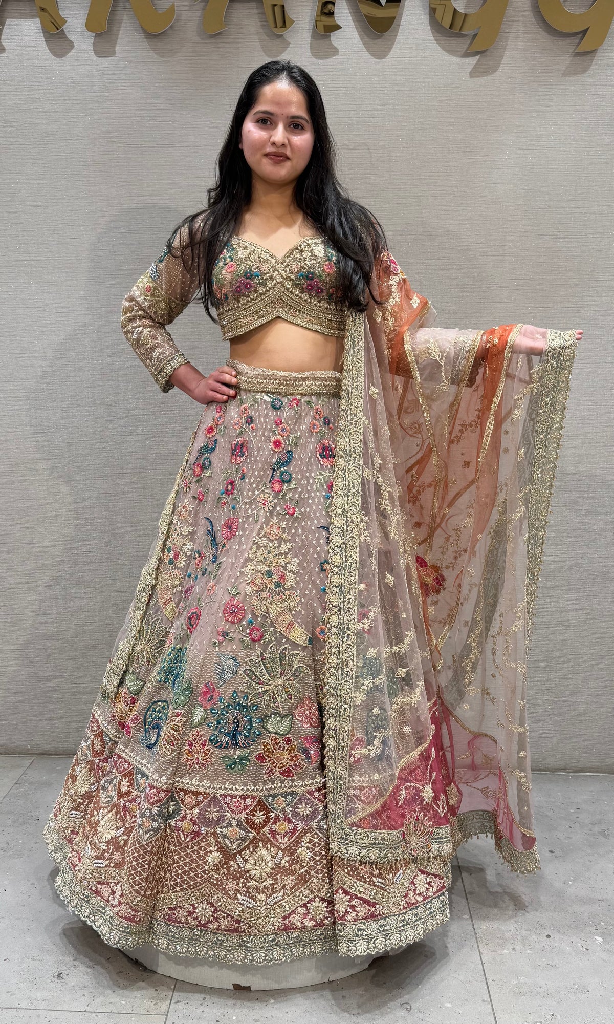PINK Multicolour Floral Embroidered netted bridal Lehenga