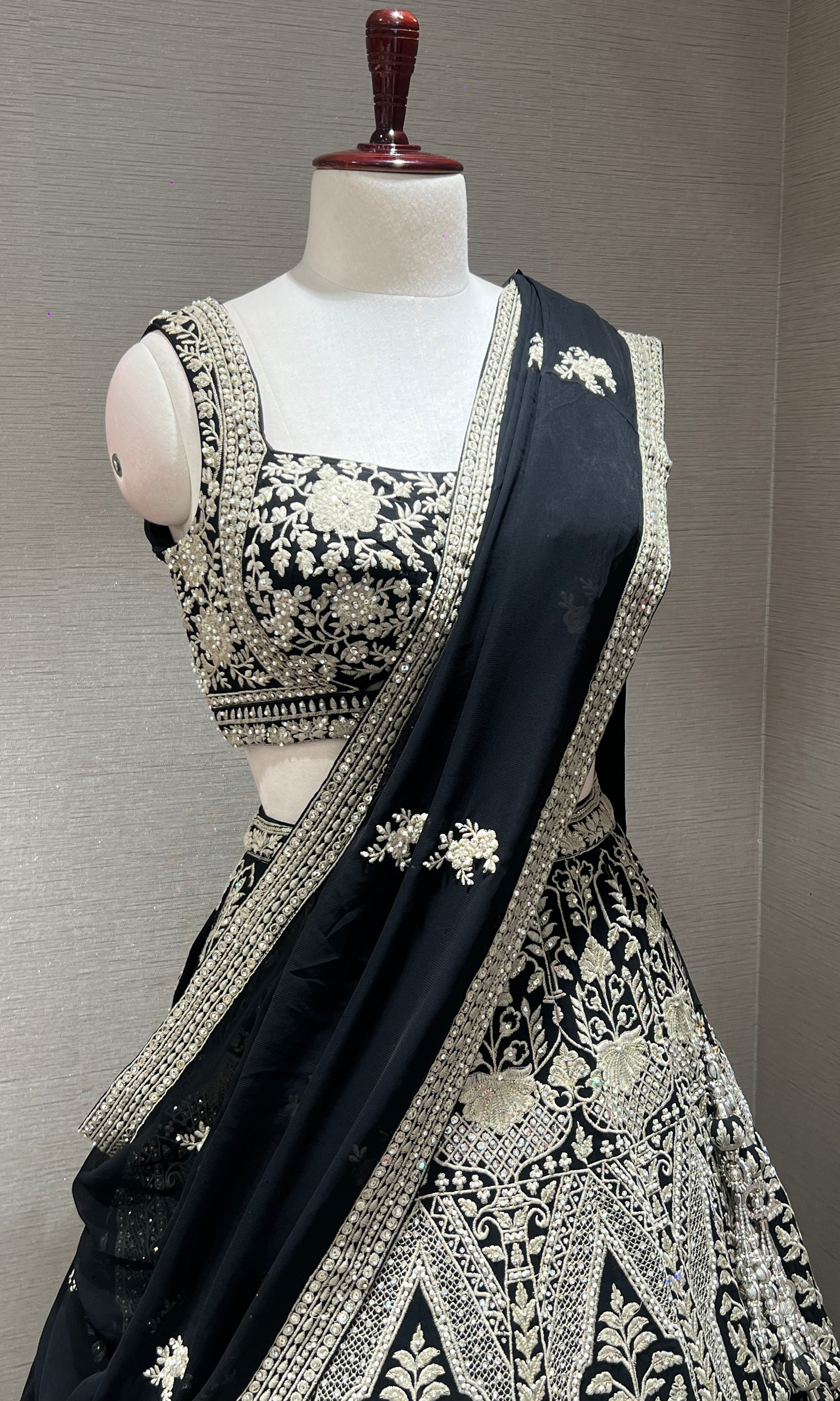 Black lehenga with intricate embroidered