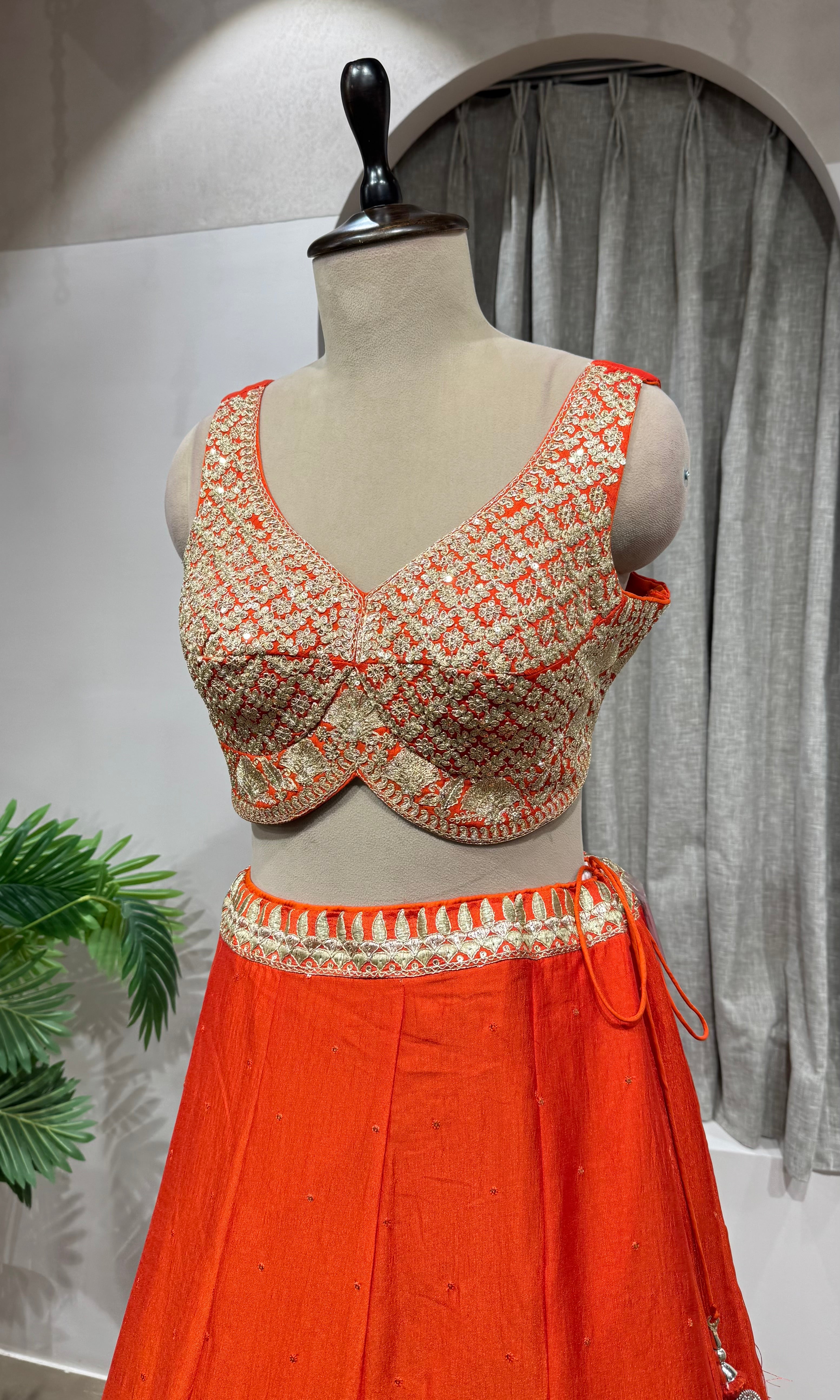 ORANGE LEHENGA WITH GOLDEN EMBROIDERY