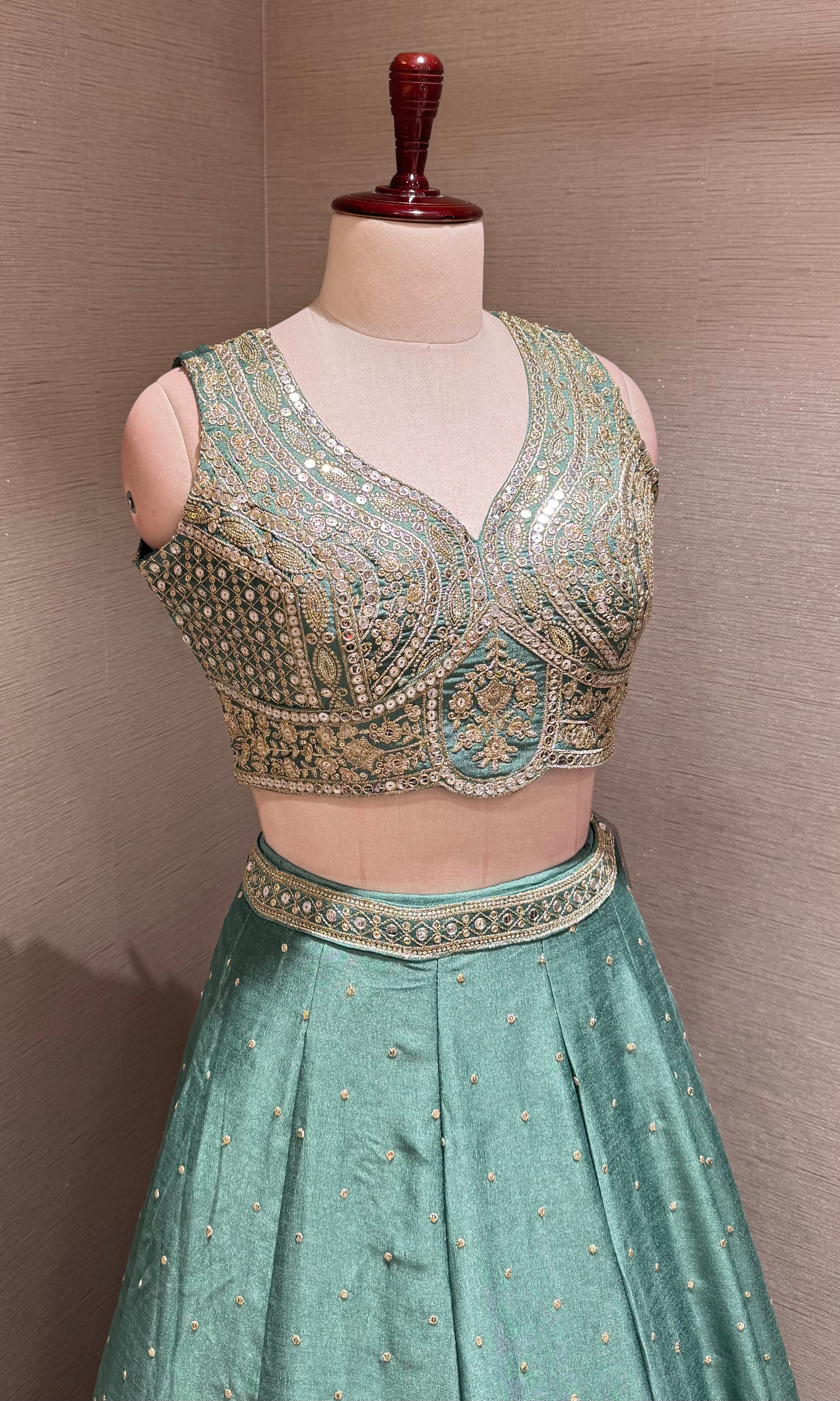 Green Flared Lehenga Choli with Heavy Gold Embroidery