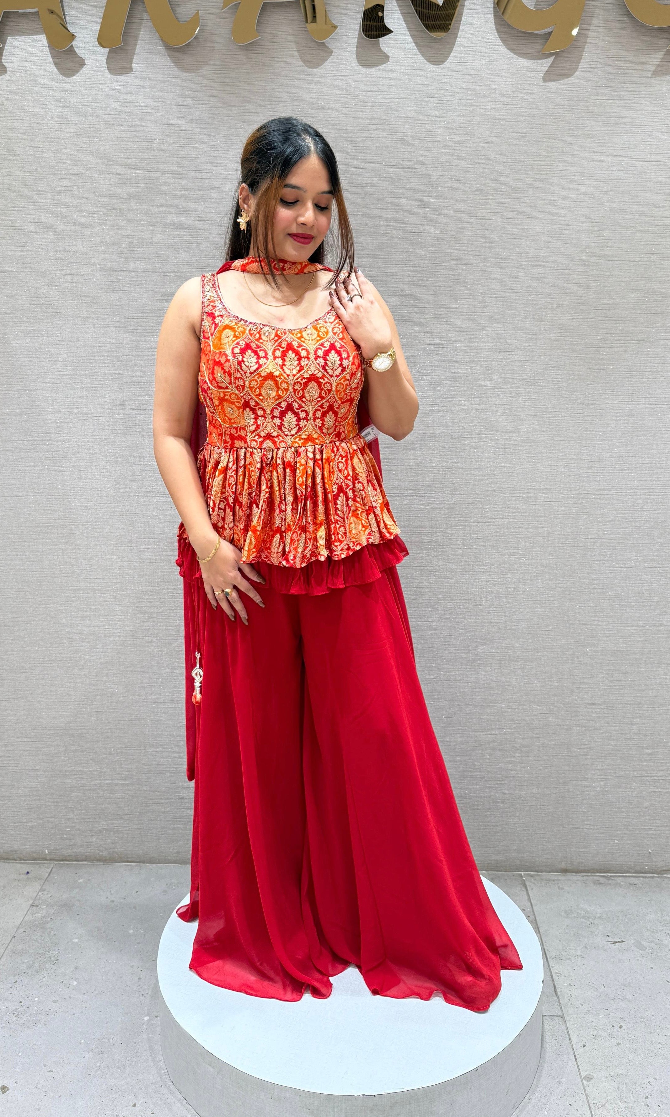Red palazzo set with peplum top