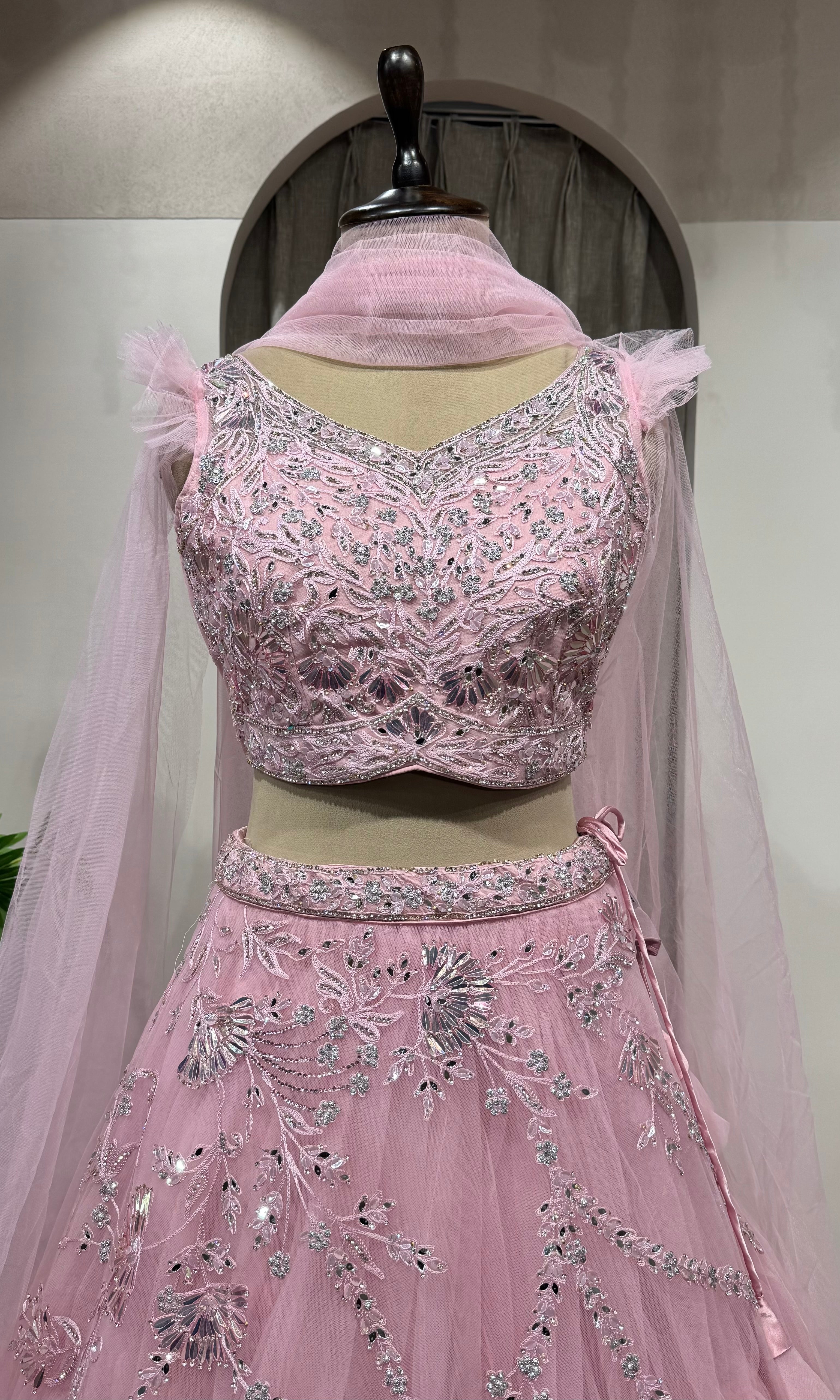 pink floral embroidered net crop top lehenga