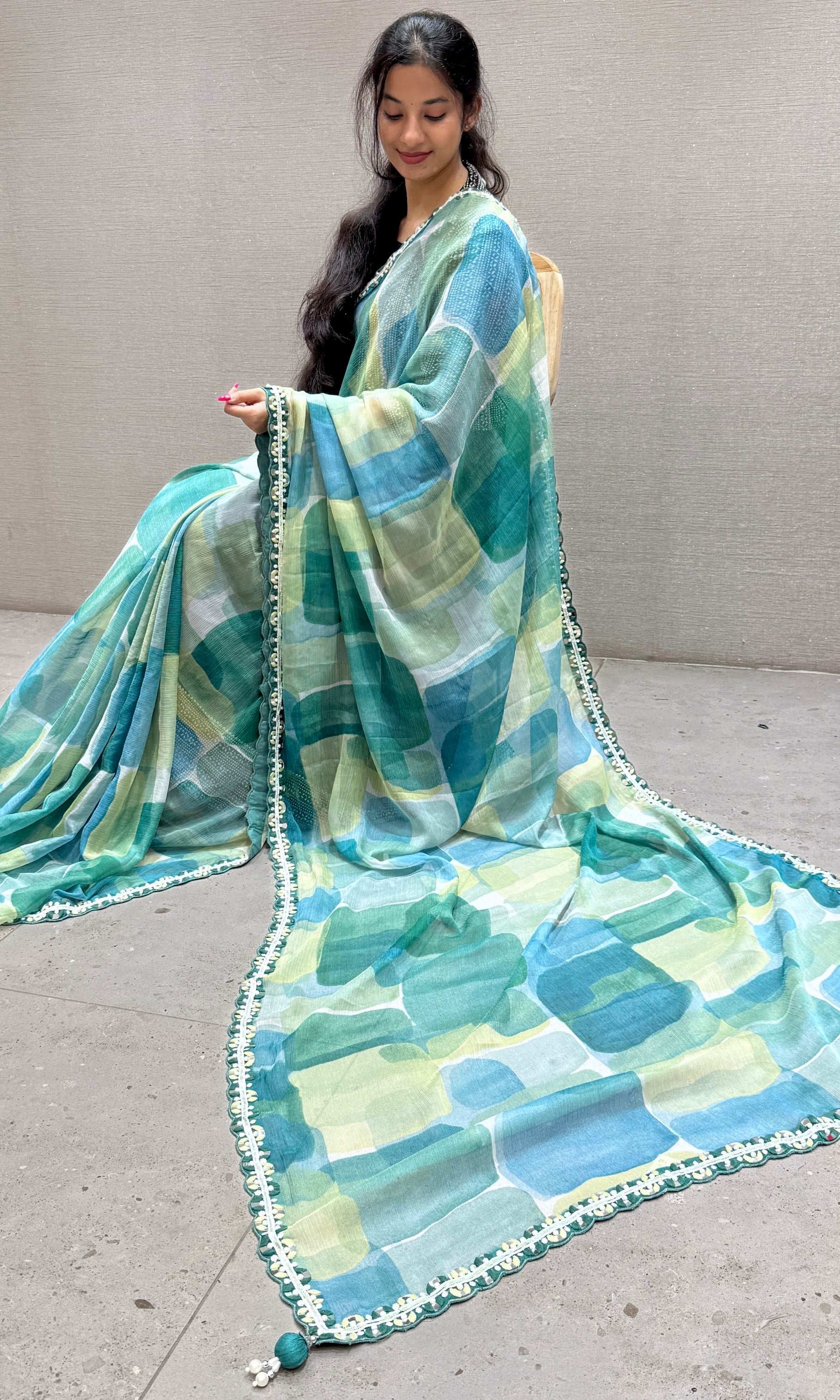 Green and blue Crushed Georgette saree with ready blouse